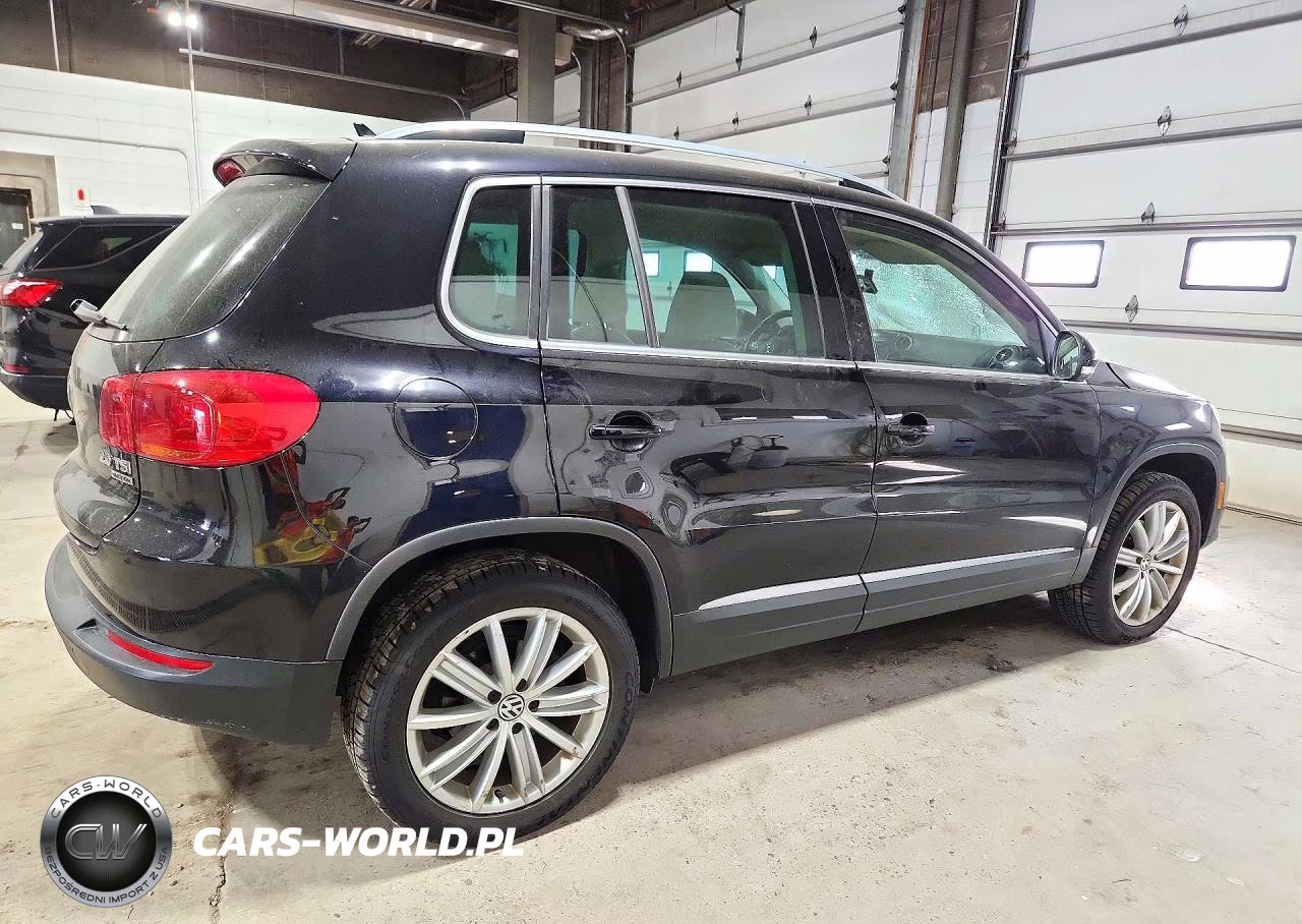 2014 Volkswagen Tiguan S VIN:WVGBV3AX0EW606566 - 3