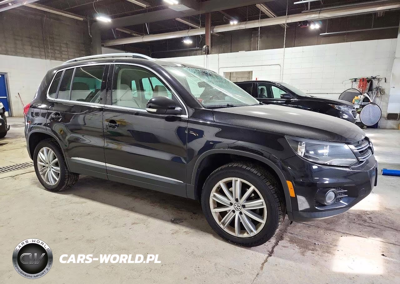 2014 Volkswagen Tiguan S VIN:WVGBV3AX0EW606566 - 4