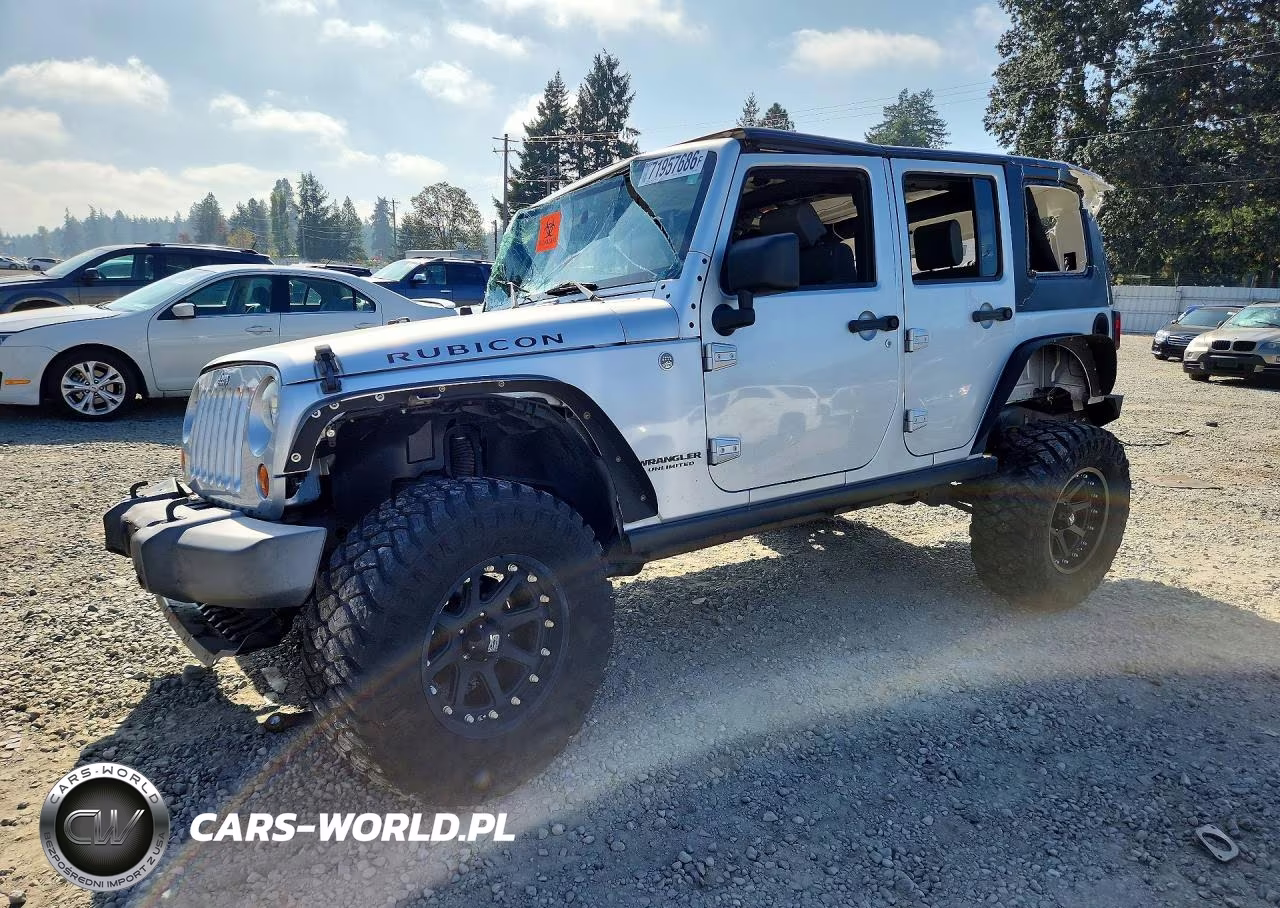 2010 Jeep Wrangler Unlimited Rubicon VIN:1J4HA6H11AL107827 - 1