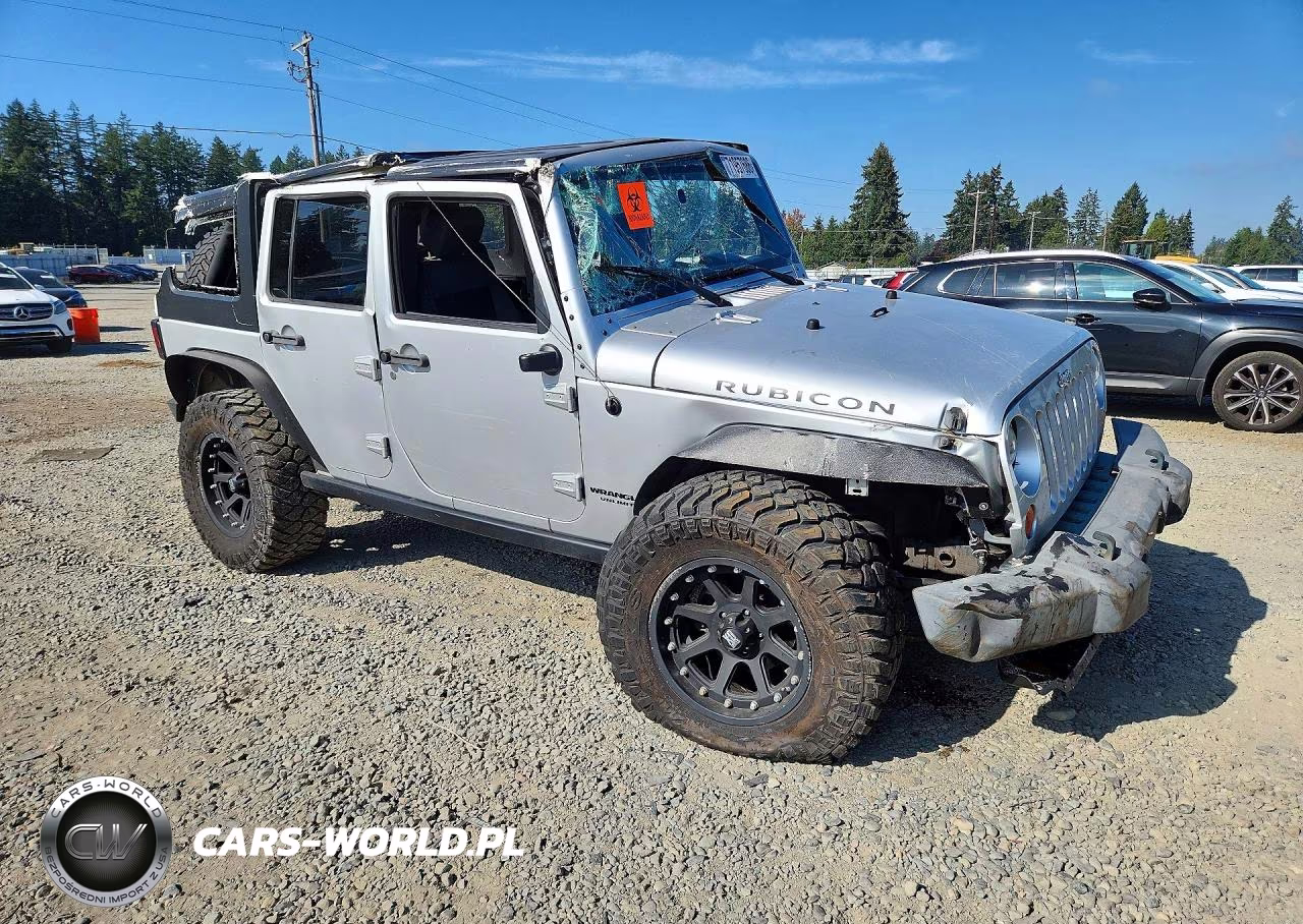 2010 Jeep Wrangler Unlimited Rubicon VIN:1J4HA6H11AL107827 - 4