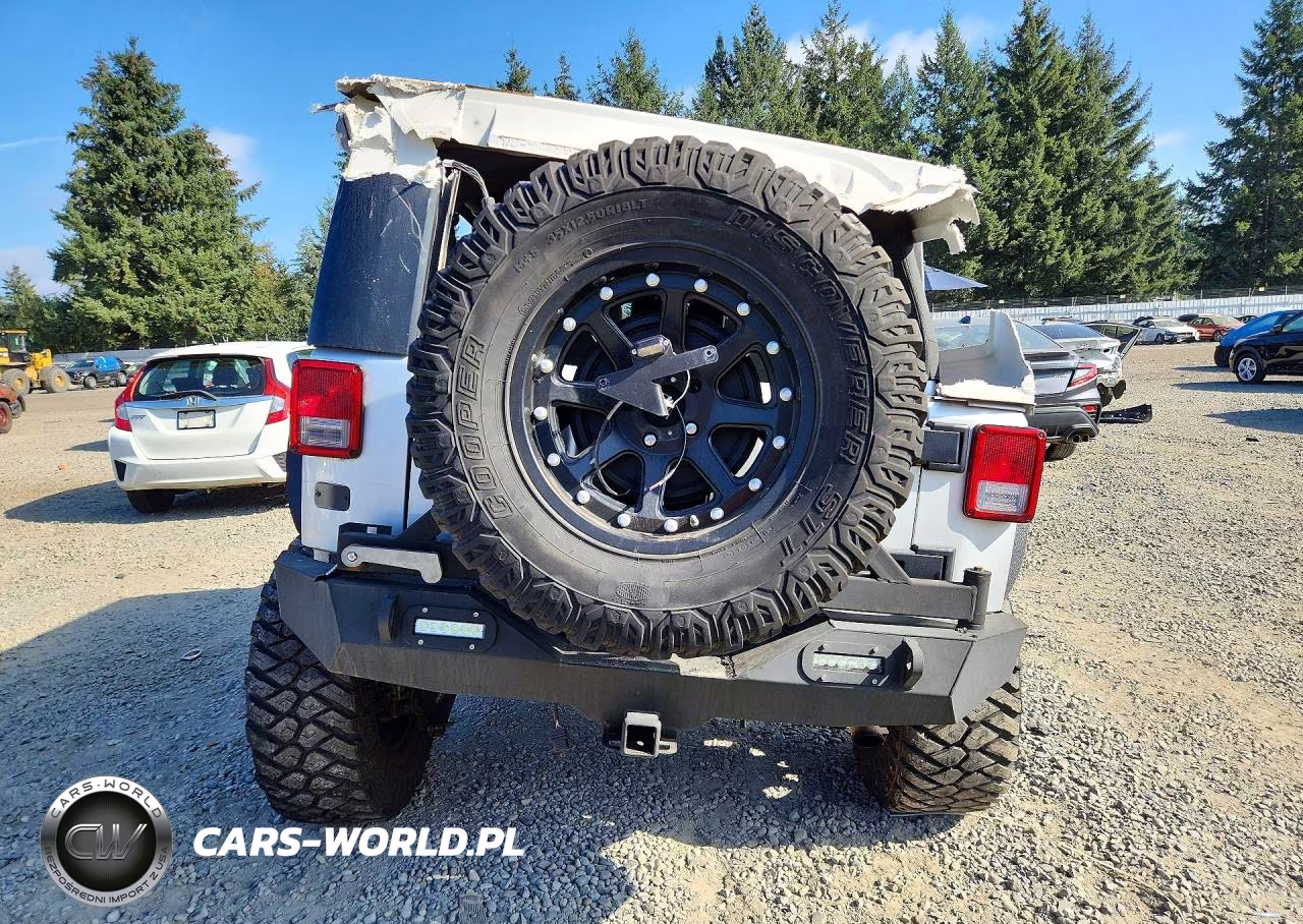 2010 Jeep Wrangler Unlimited Rubicon VIN:1J4HA6H11AL107827 - 6