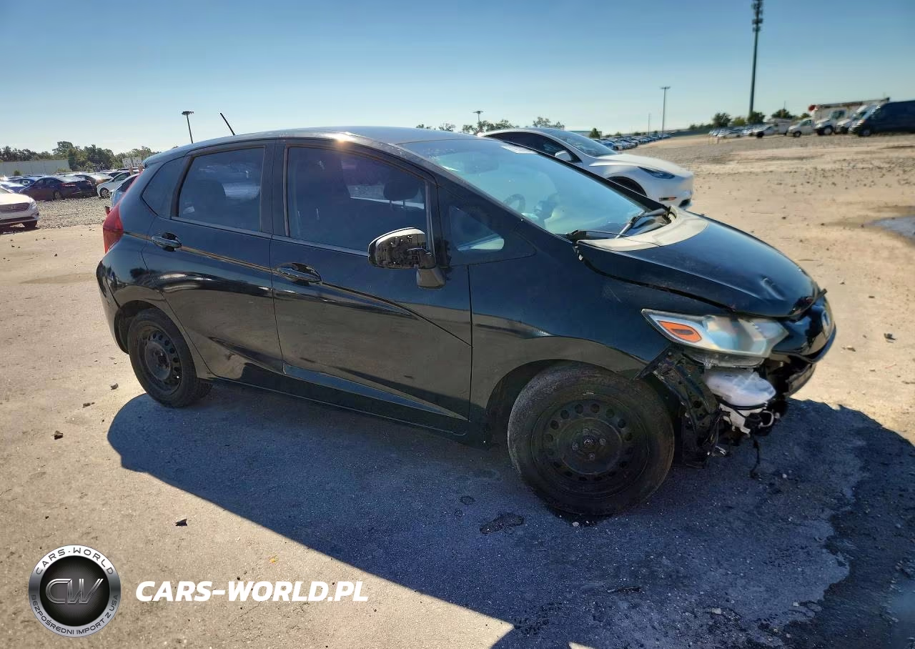 2015 Honda Fit Lx VIN:3HGGK5H51FM715477 - 4