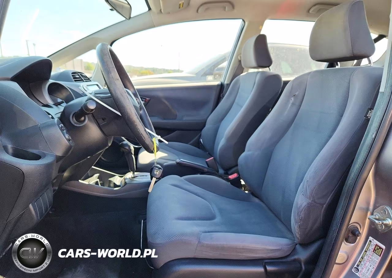 2010 Honda Fit VIN:JHMGE8H21AS020590 - 7
