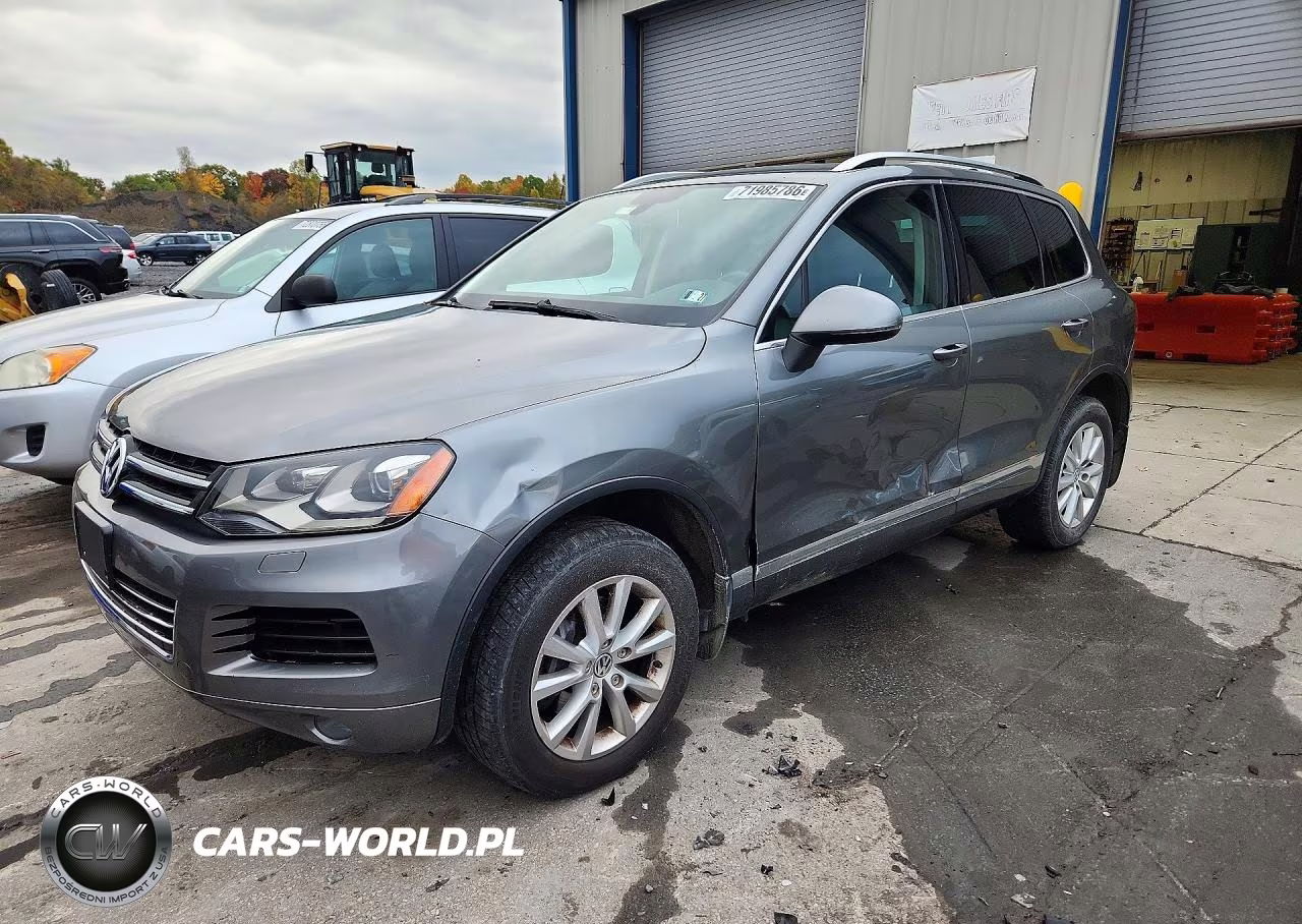 2014 Volkswagen Touareg V6 VIN:WVGEF9BP3ED013873 - 1