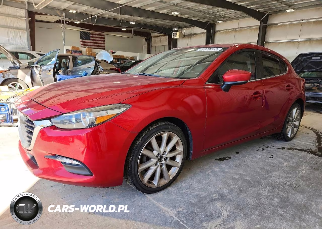 2017 Mazda 3 Touring VIN:JM1BN1L31H1143650 - 1
