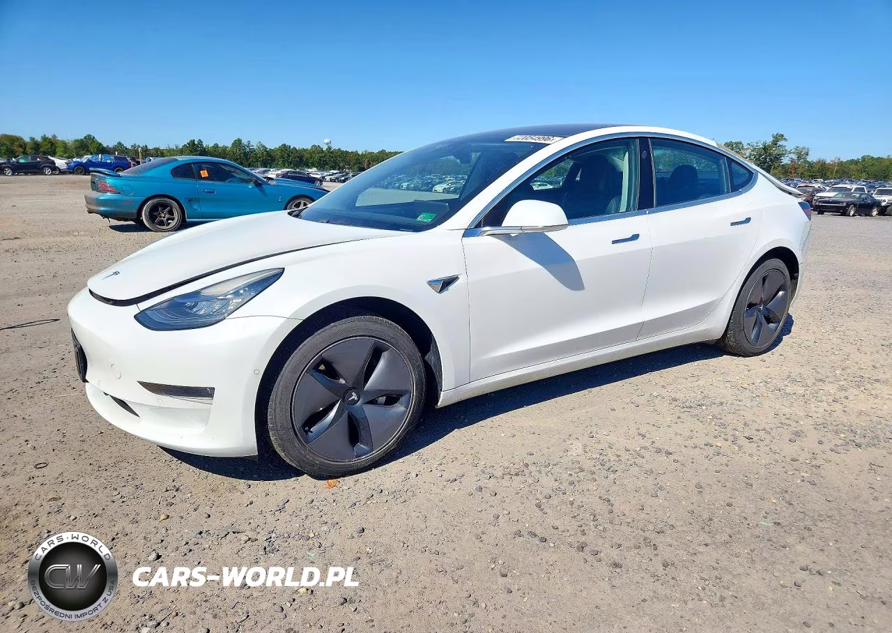 2018 Tesla Model 3 VIN:5YJ3E1EB2JF066924 - 1