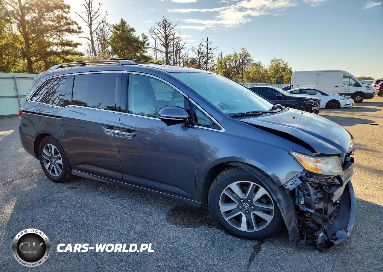 2016 Honda Odyssey Touring VIN:5FNRL5H97GB160760 - 4