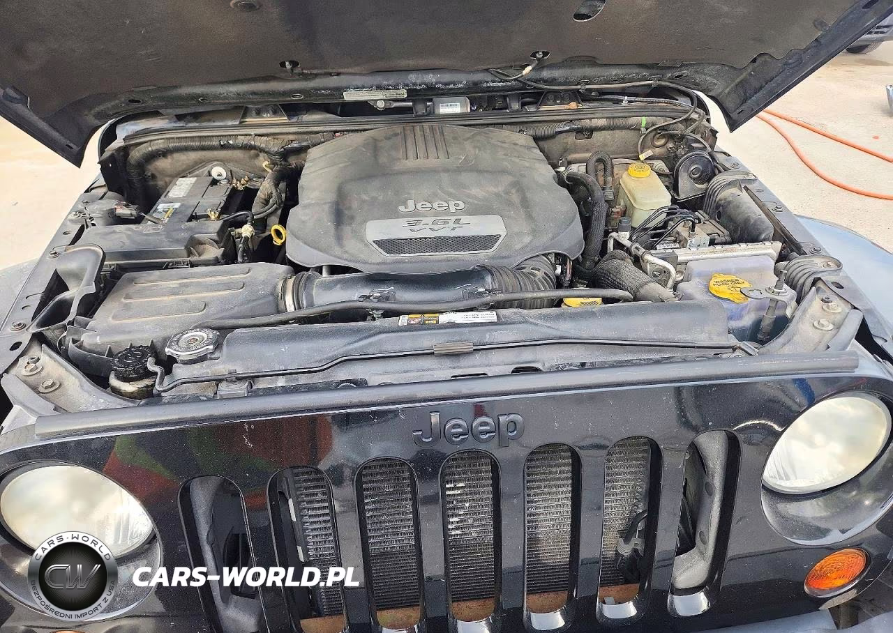2013 Jeep Wrangler Unlimited Sahara VIN:1C4HJWEG5DL580603 - 12