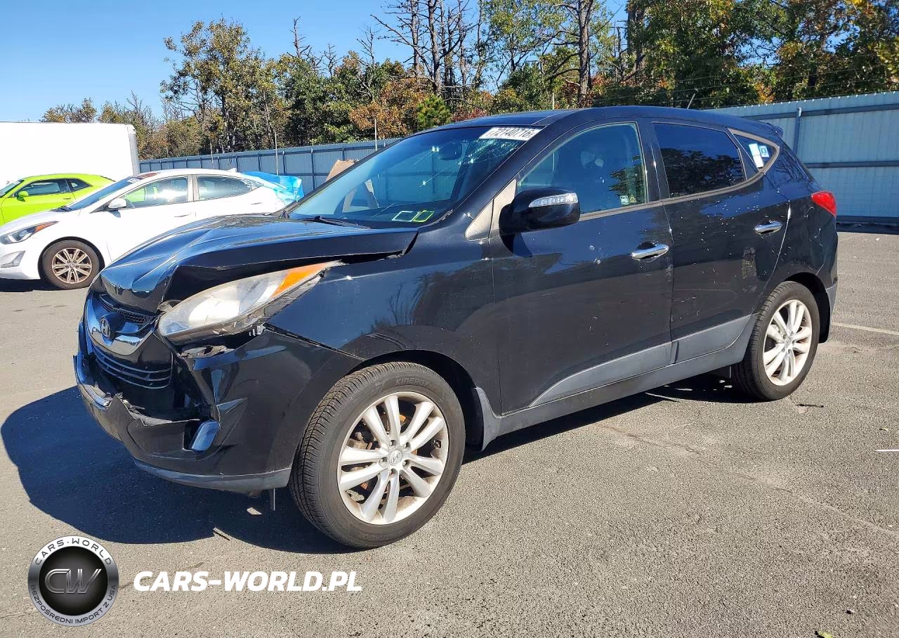2012 Hyundai Tucson Limited VIN:KM8JUCAC0CU378394 - 1