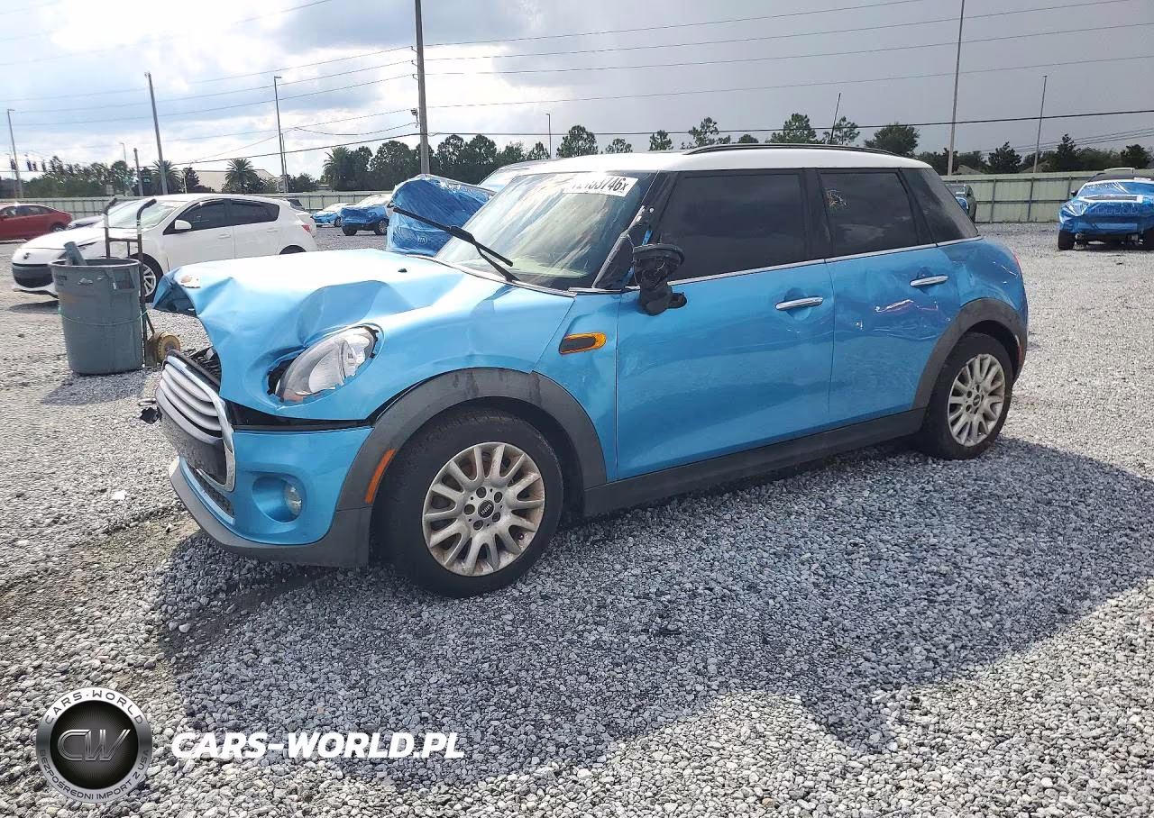 2015 Mini Cooper VIN:WMWXS5C50FT831290 - 1
