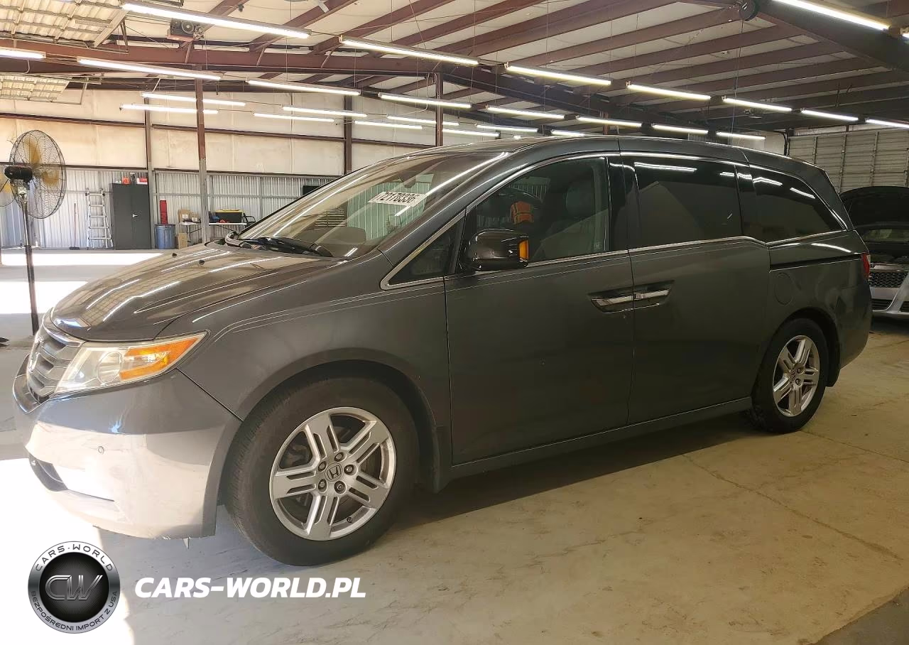 2012 Honda Odyssey Touring VIN:5FNRL5H93CB130147 - 1