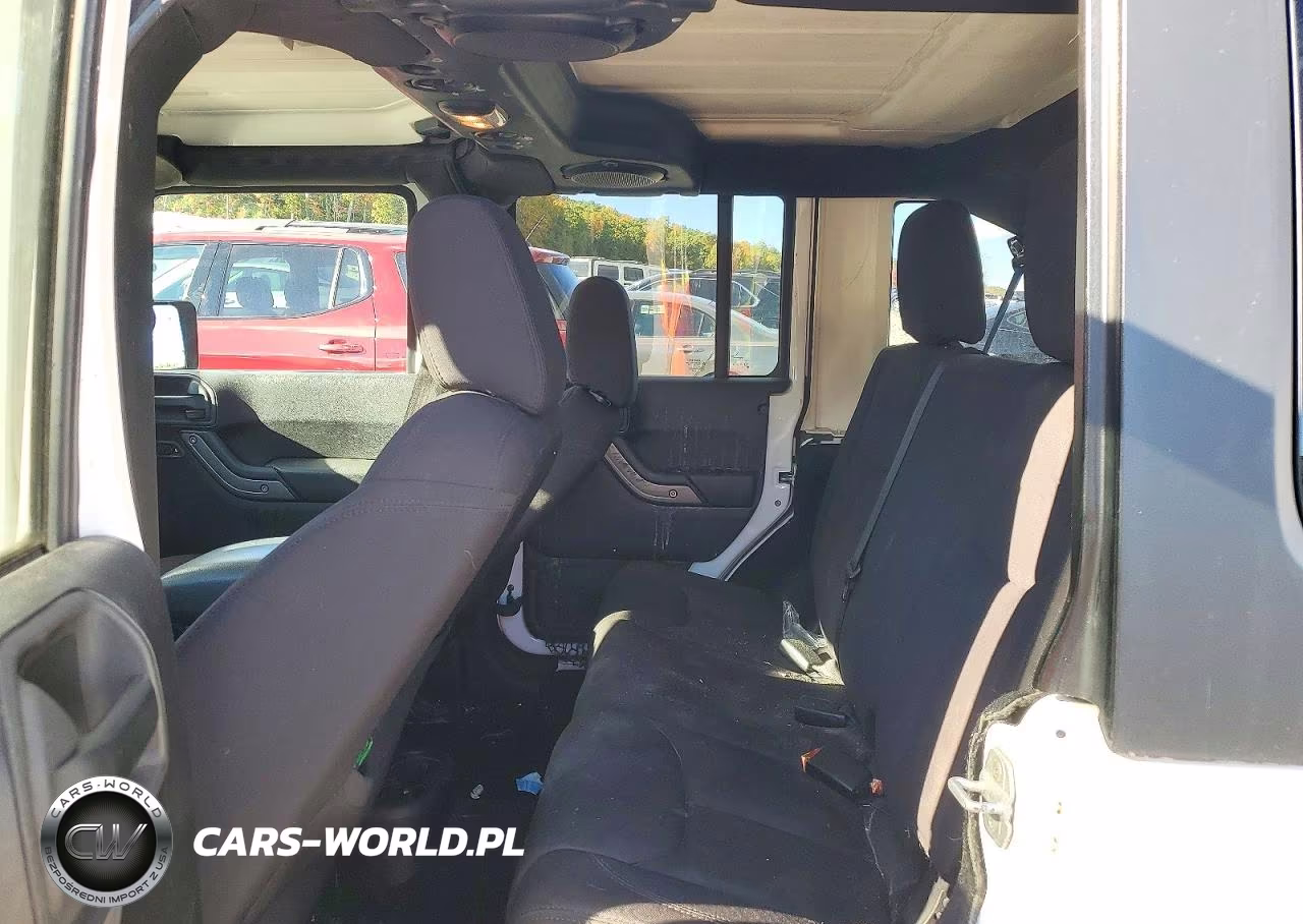 2013 Jeep Wrangler Unlimited Sport VIN:1C4BJWDG9DL702113 - 11