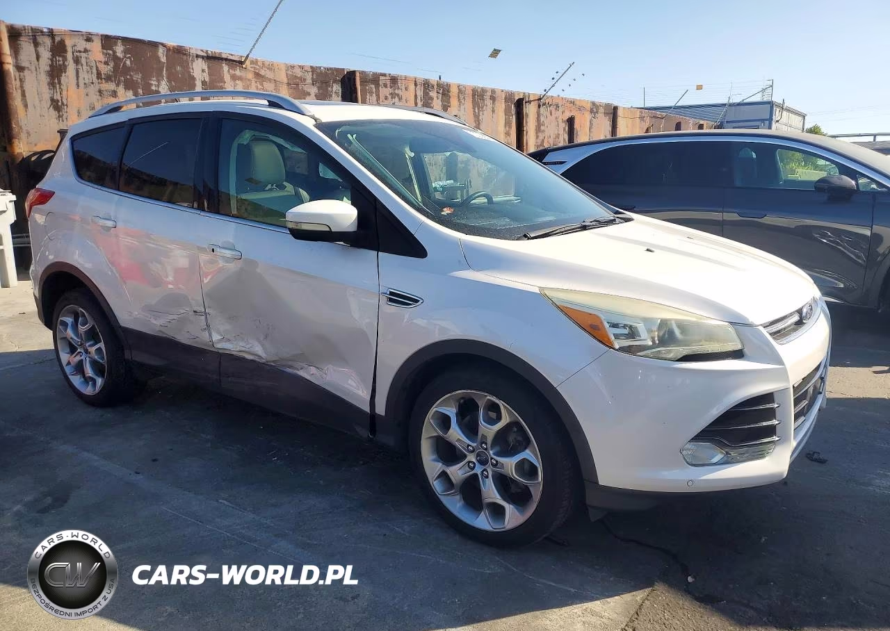 2015 Ford Escape Titanium VIN:1FMCU0J99FUC74583 - 4
