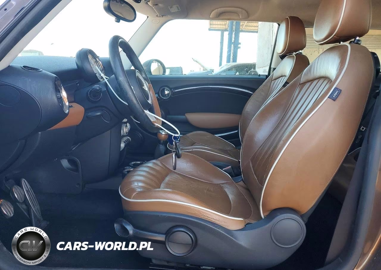 2010 Mini Cooper S VIN:WMWMF7C57ATX45129 - 7