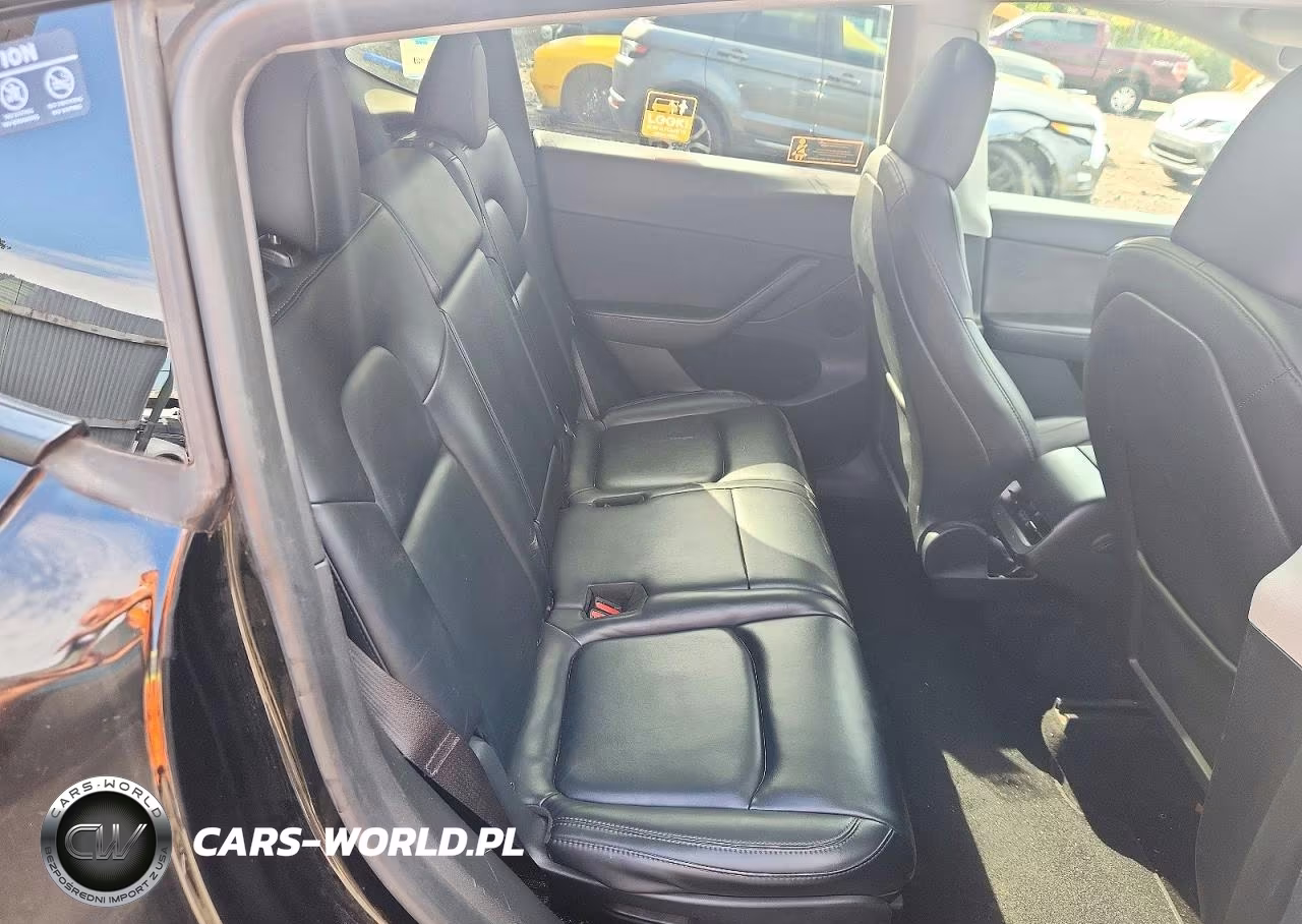 2023 Tesla Model Y VIN:7SAYGAEE2PF921238 - 10