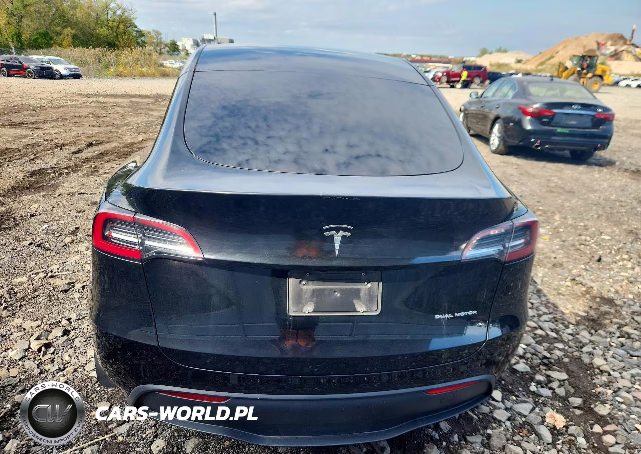 2023 Tesla Model Y VIN:7SAYGAEE2PF921238 - 6