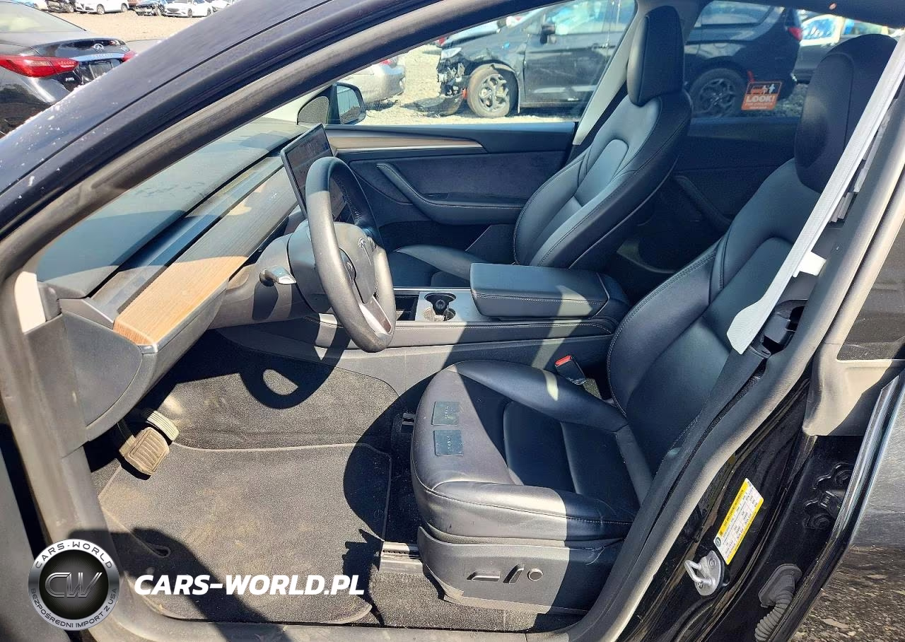 2023 Tesla Model Y VIN:7SAYGAEE2PF921238 - 7