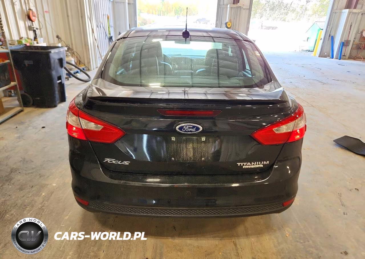 2014 Ford Focus Titanium VIN:1FADP3J22EL105181 - 6