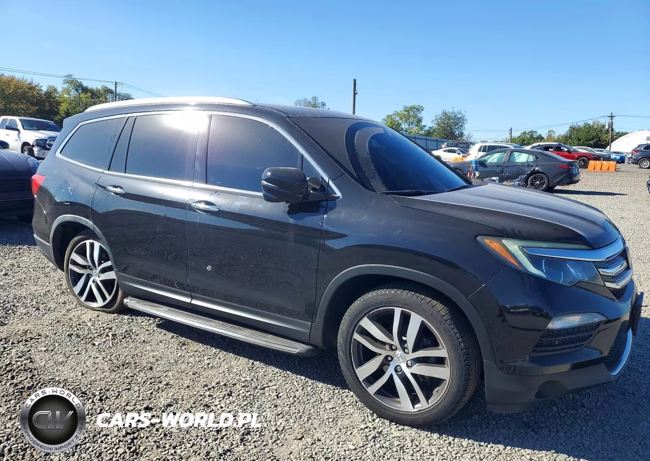 2018 Honda Pilot Touring VIN:5FNYF6H96JB012695 - 4