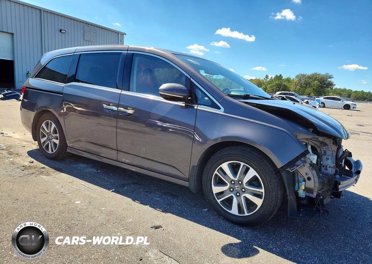 2016 Honda Odyssey Touring VIN:5FNRL5H91GB010322 - 4