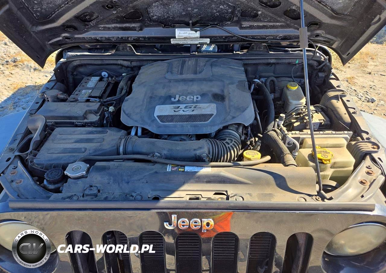 2012 Jeep Wrangler Unlimited Sport VIN:1C4BJWDG9CL281654 - 12