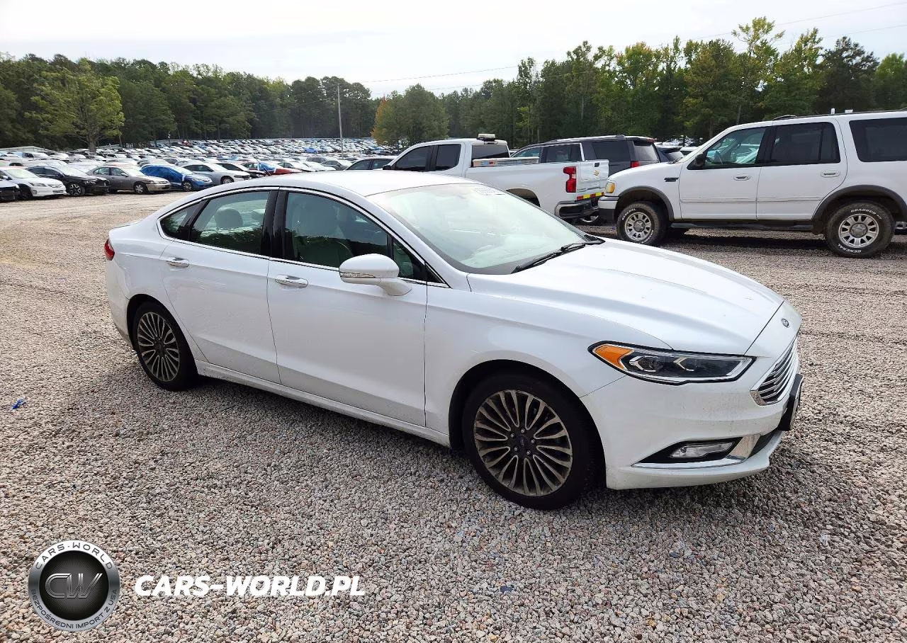 2017 Ford Fusion Titanium VIN:3FA6P0K94HR115087 - 4