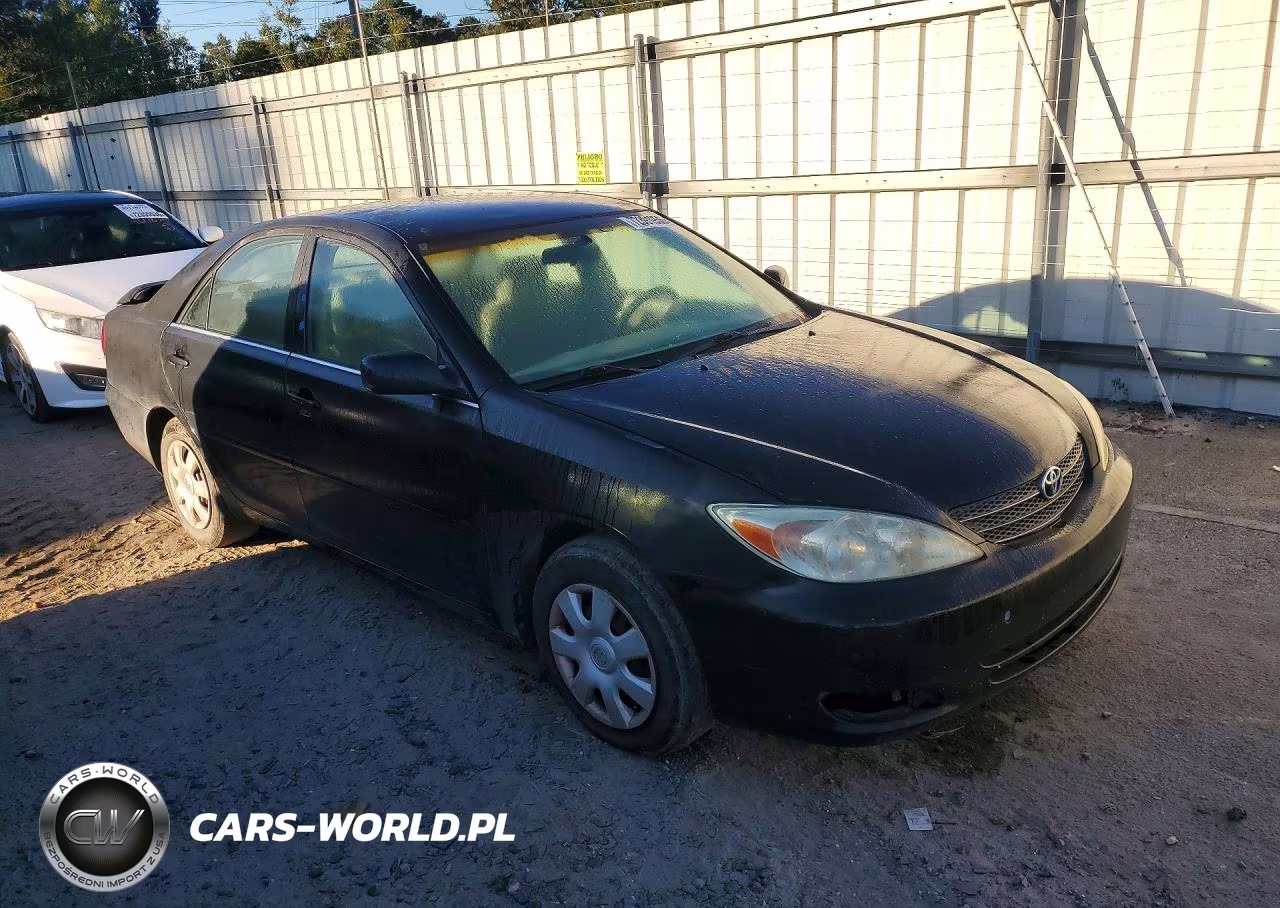 2002 Toyota Camry Le VIN:4T1BE32K62U087100 - 4