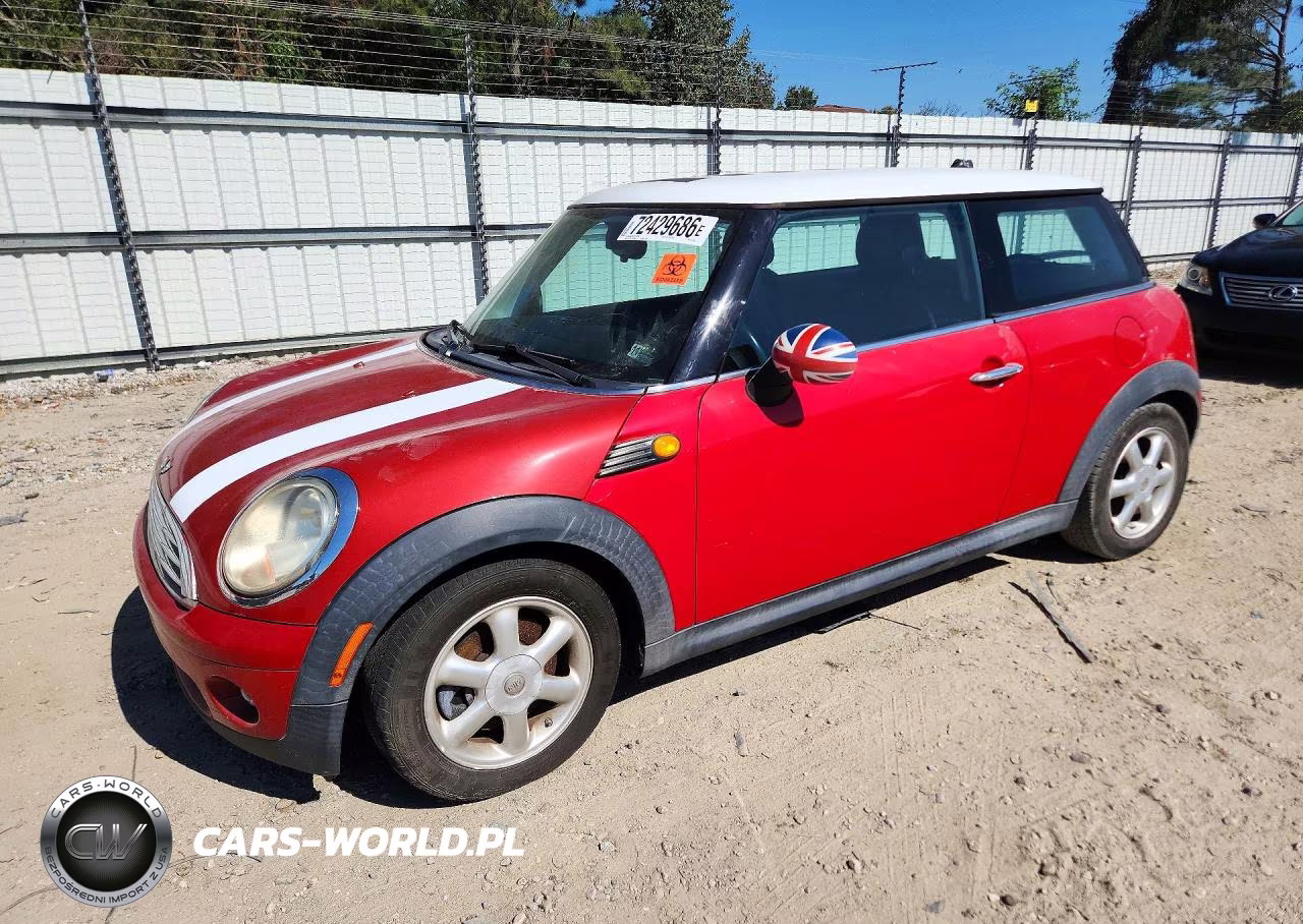 2010 Mini Cooper VIN:WMWMF3C58ATU77880 - 1