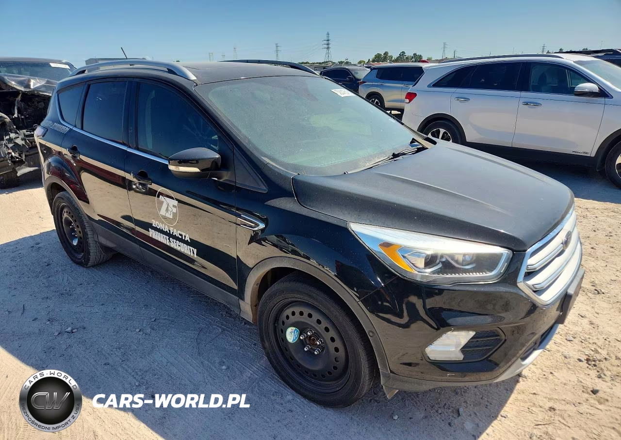 2018 Ford Escape Titanium VIN:1FMCU0J96JUA03862 - 4
