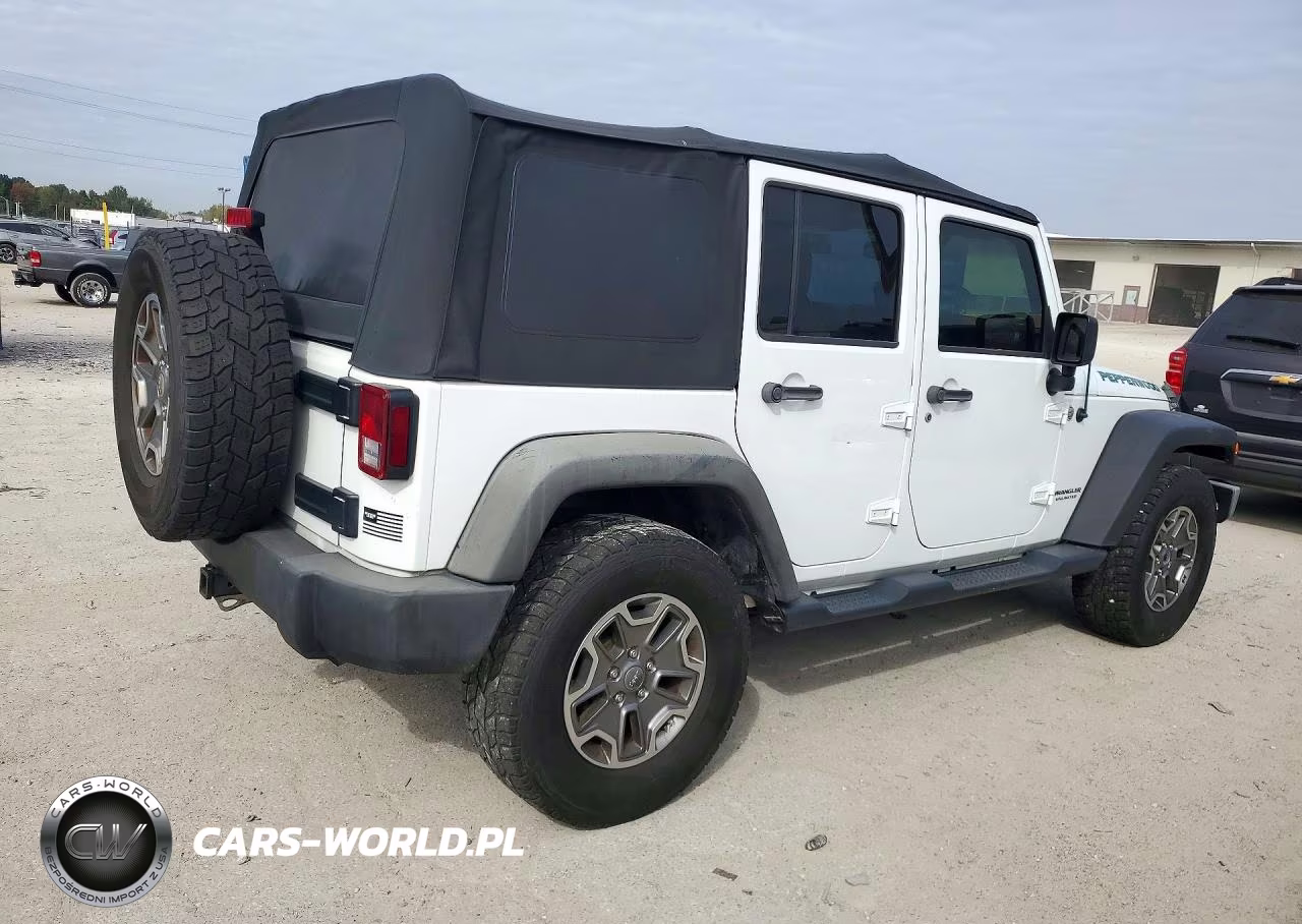 2014 Jeep Wrangler Unlimited Rubicon VIN:1C4BJWFG4EL120032 - 3