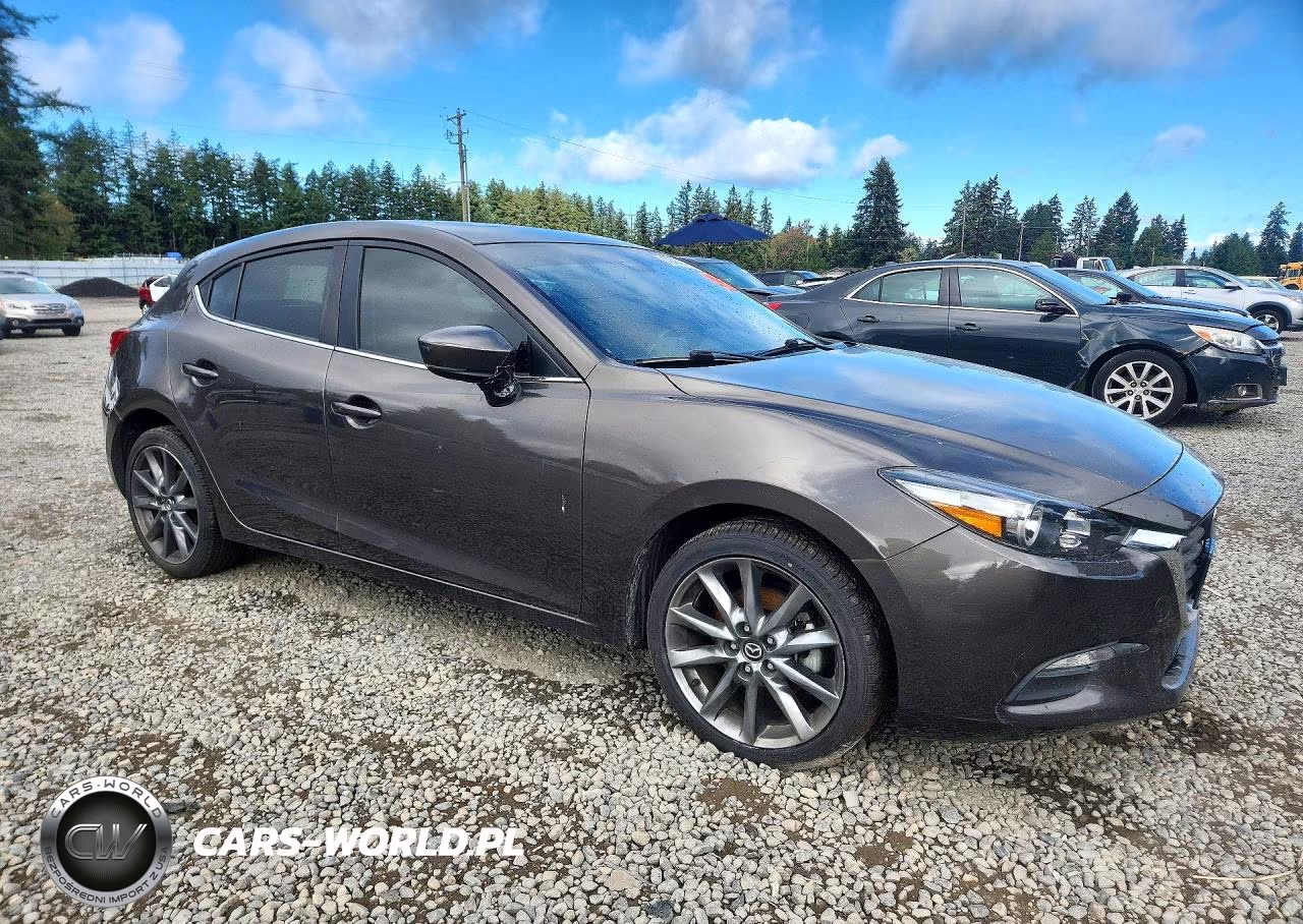2018 Mazda 3 Touring VIN:3MZBN1L30JM188262 - 4