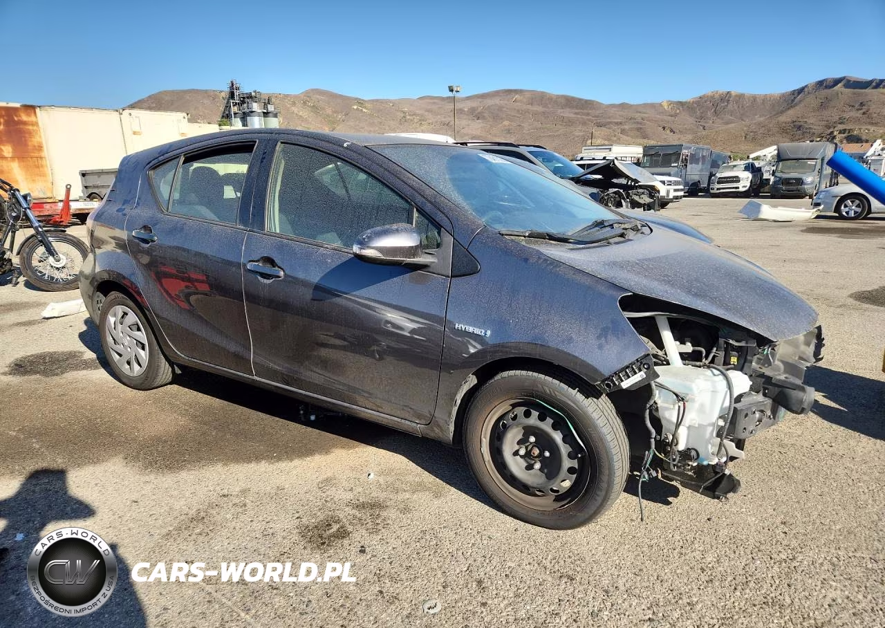 2015 Toyota Prius C Two VIN:JTDKDTB32F1100335 - 4