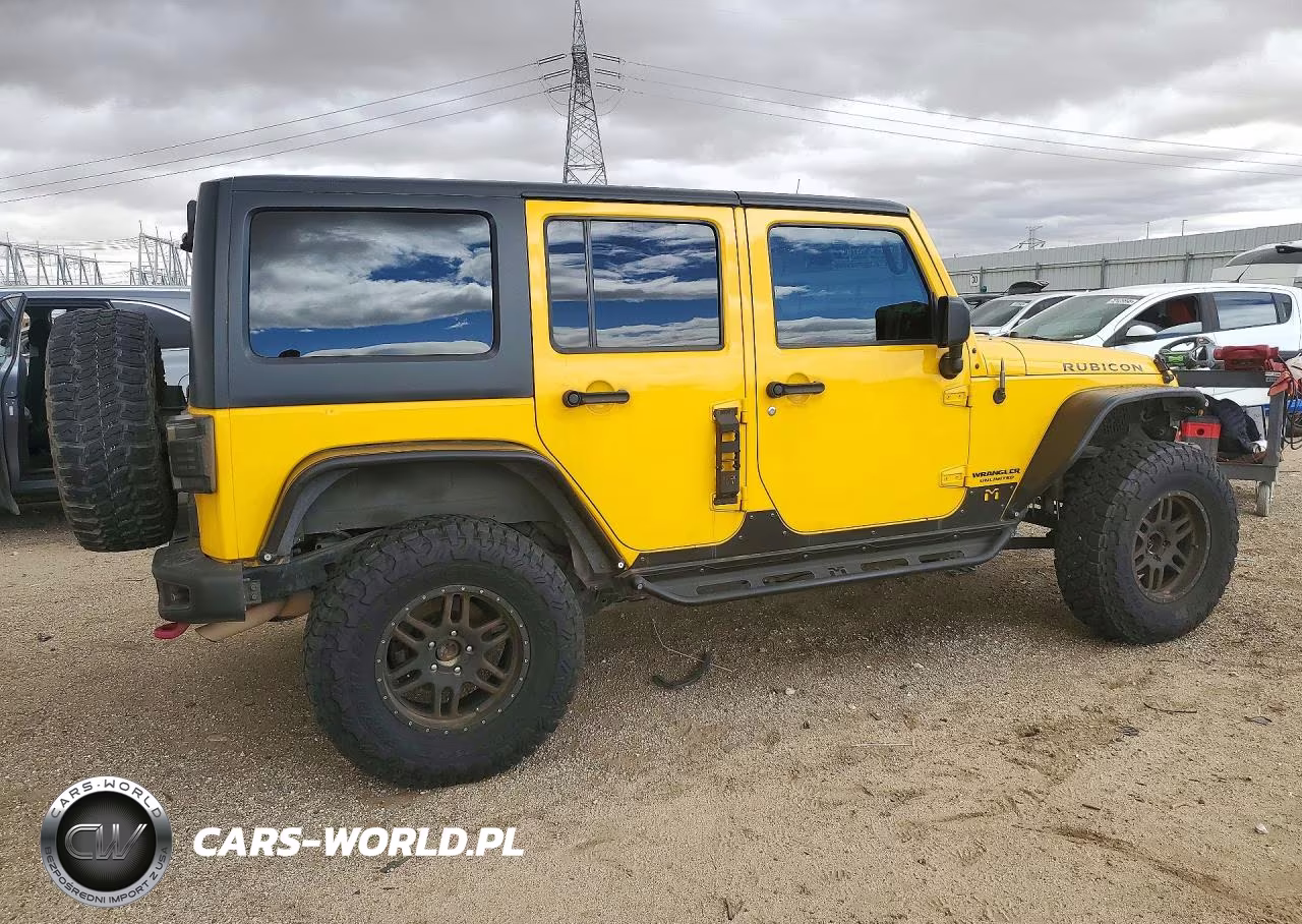 2015 Jeep Wrangler Unlimited Rubicon VIN:1C4BJWFG4FL659946 - 3