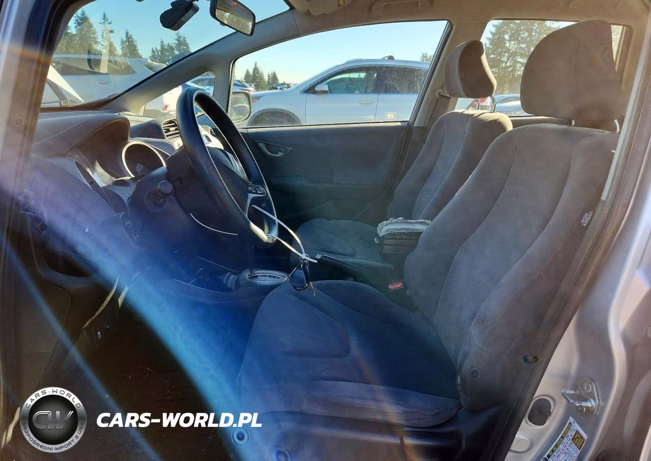2011 Honda Fit VIN:JHMGE8H32BS011150 - 7