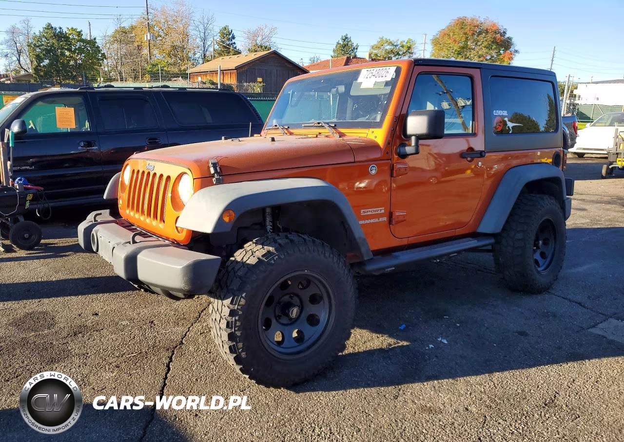 2011 Jeep Wrangler Sport VIN:1J4AA2D14BL597259 - 1