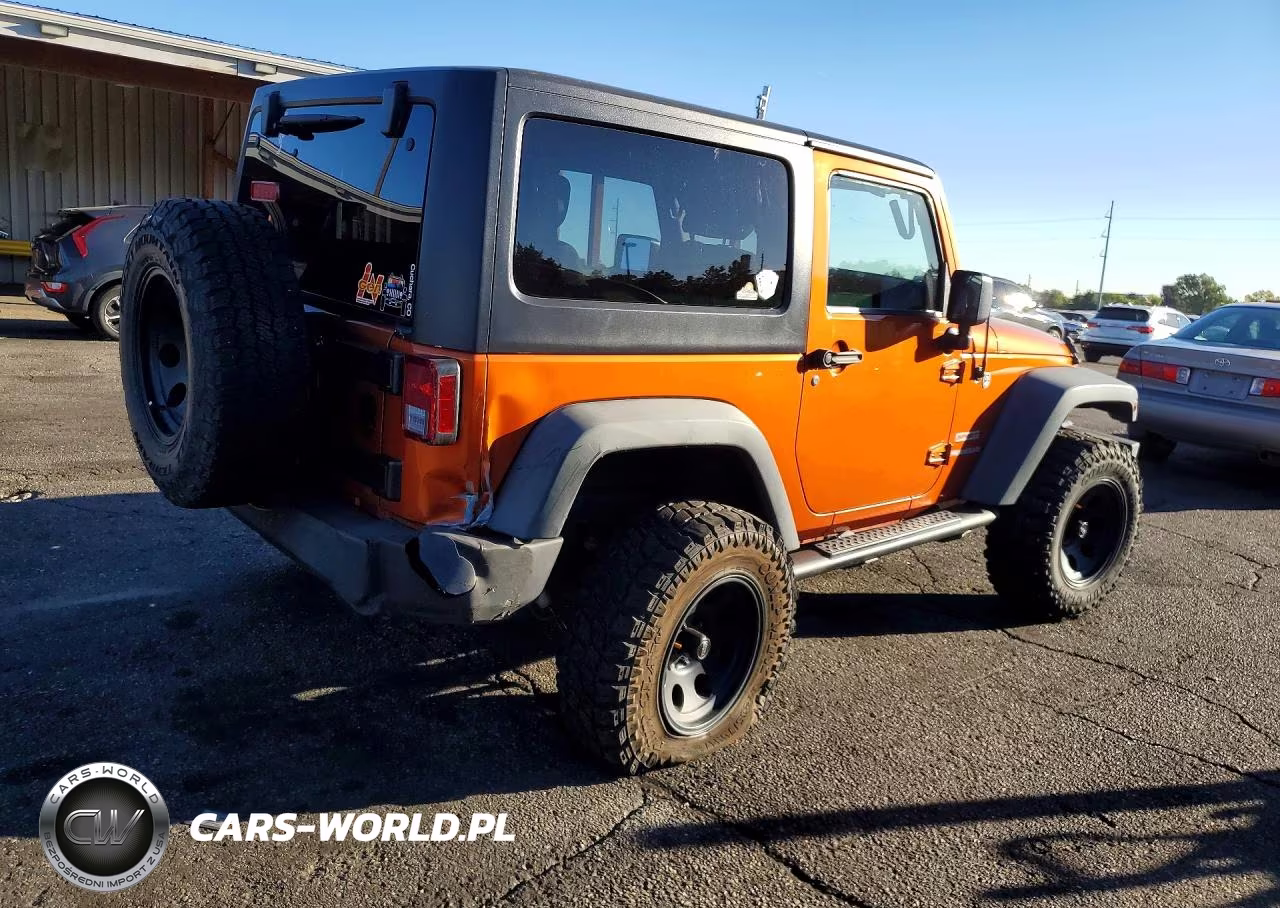 2011 Jeep Wrangler Sport VIN:1J4AA2D14BL597259 - 3