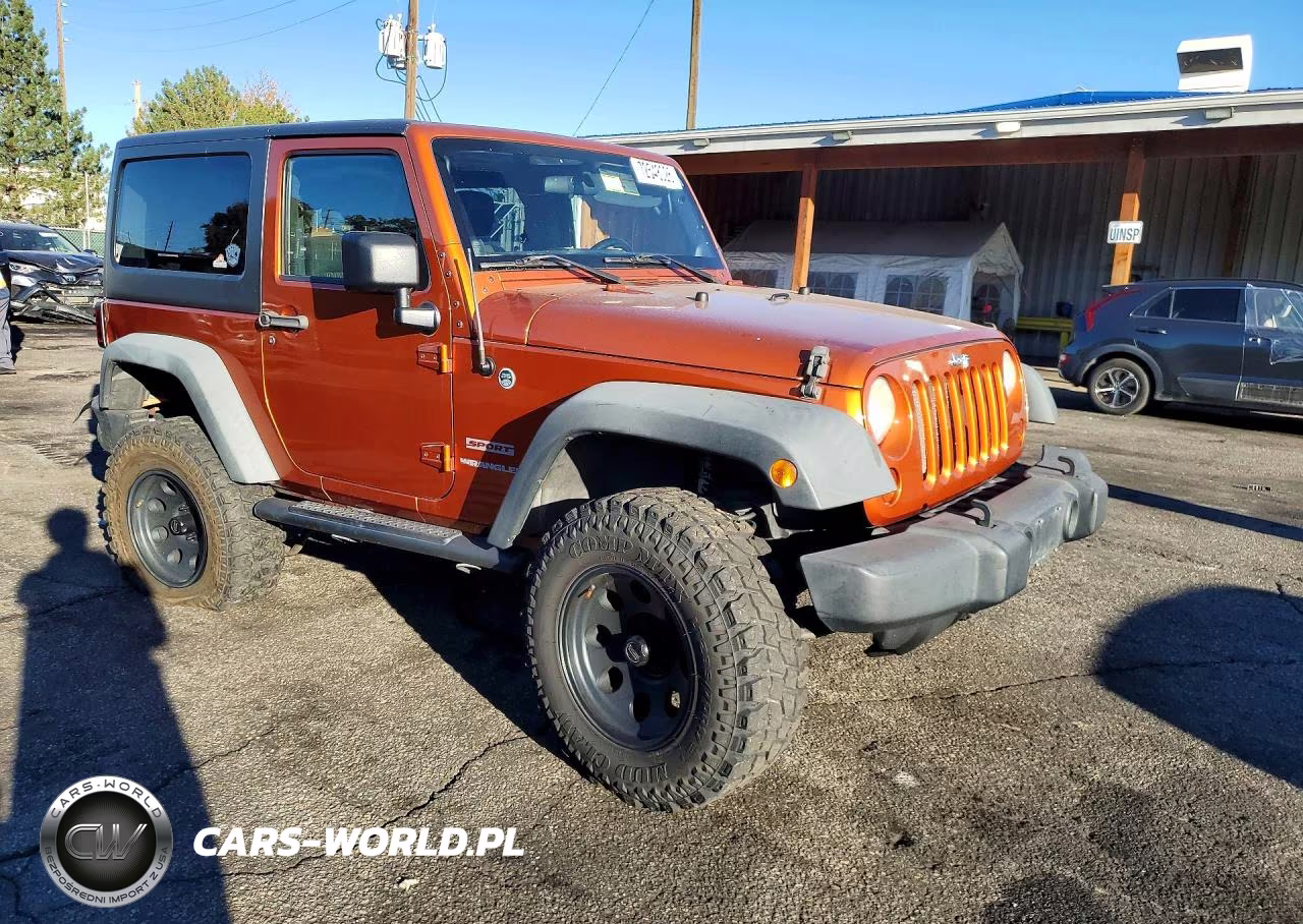 2011 Jeep Wrangler Sport VIN:1J4AA2D14BL597259 - 4