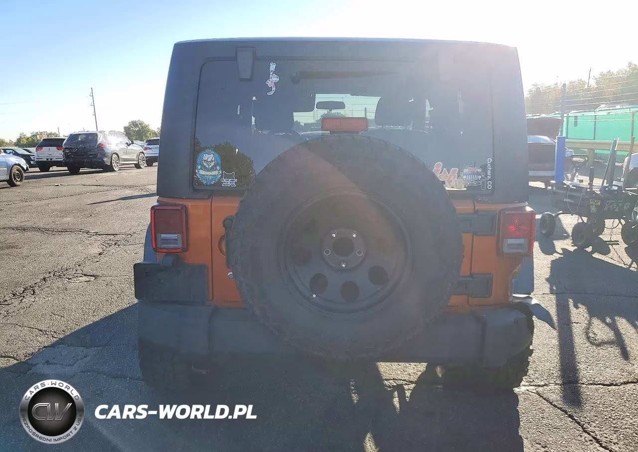 2011 Jeep Wrangler Sport VIN:1J4AA2D14BL597259 - 6