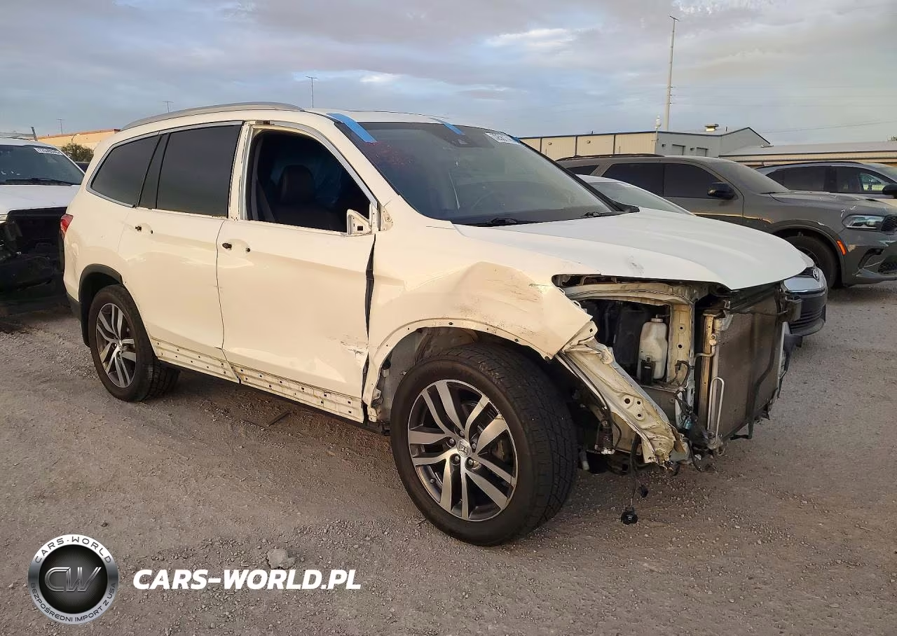 2017 Honda Pilot Elite VIN:5FNYF6H04HB057758 - 4