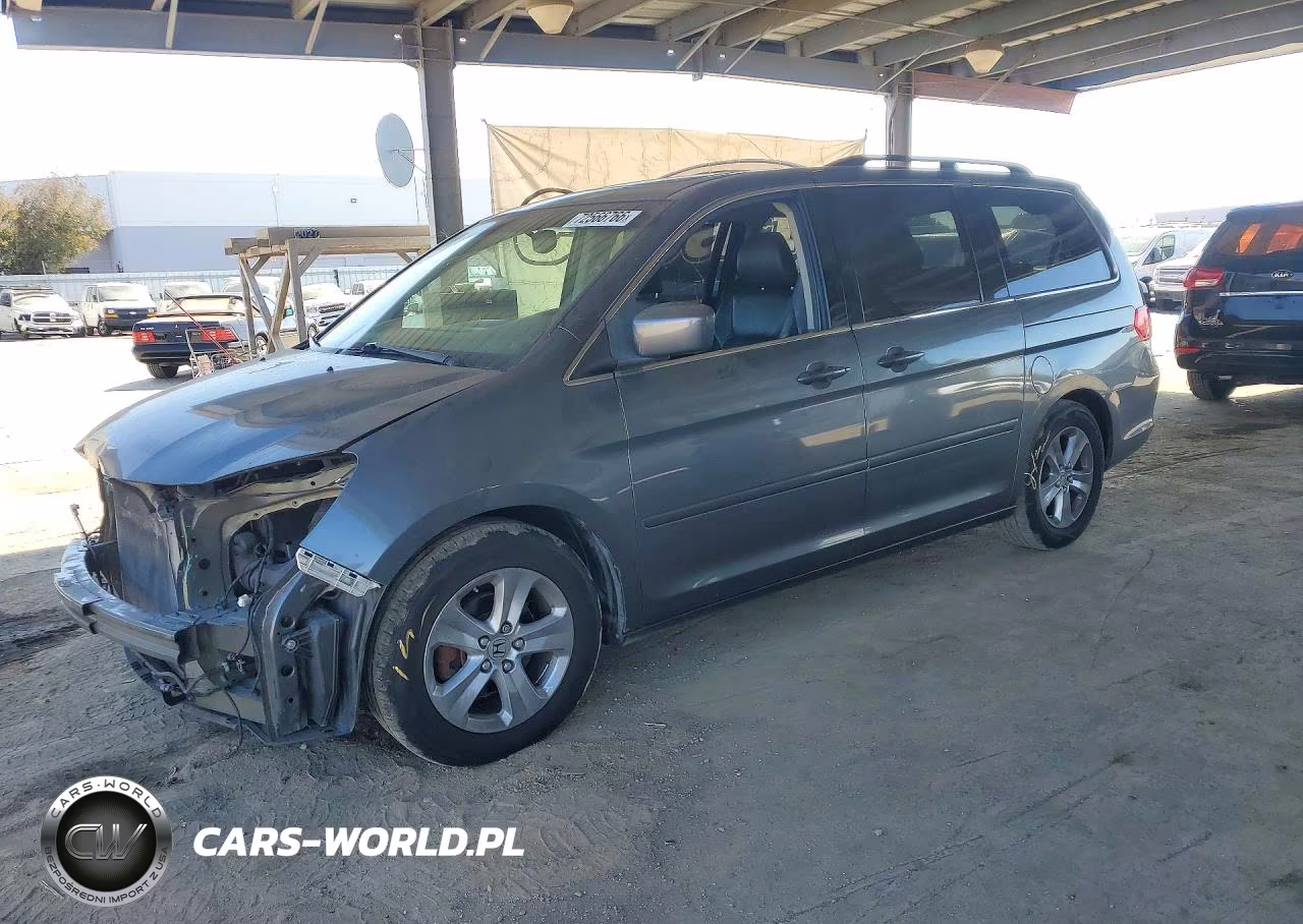2010 Honda Odyssey Touring VIN:5FNRL3H92AB044765 - 1