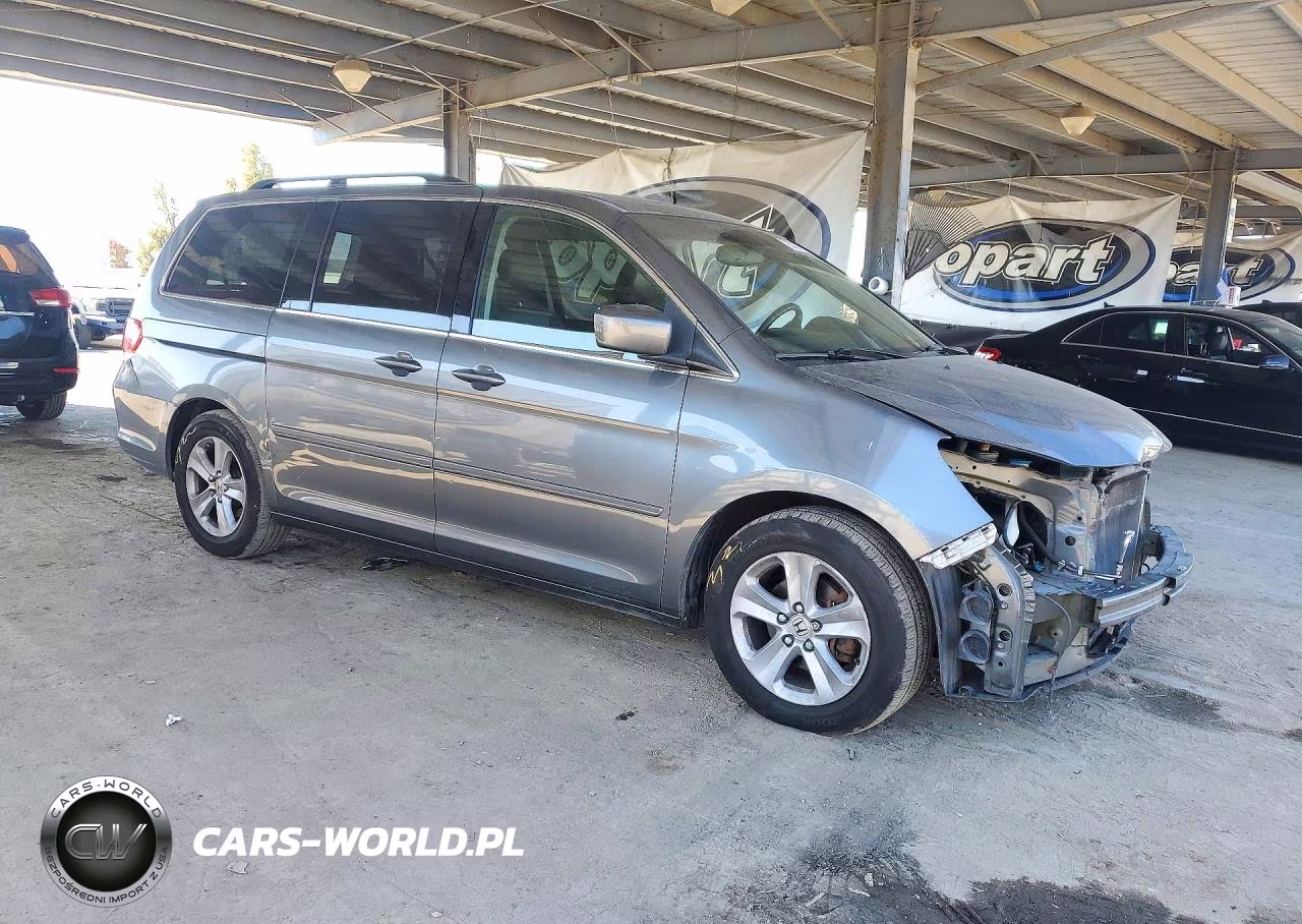 2010 Honda Odyssey Touring VIN:5FNRL3H92AB044765 - 4