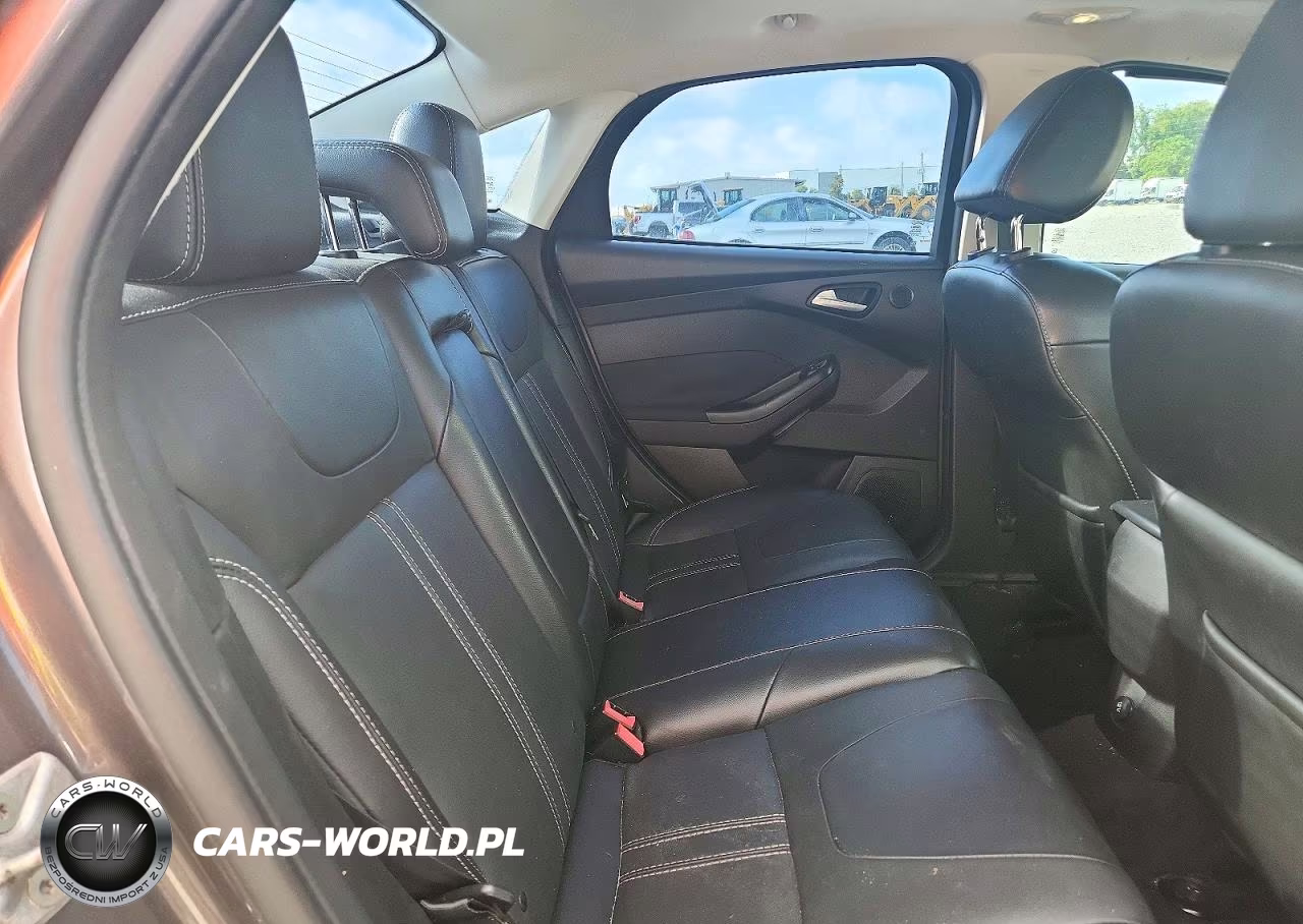 2013 Ford Focus Titanium VIN:1FADP3J24DL383692 - 10