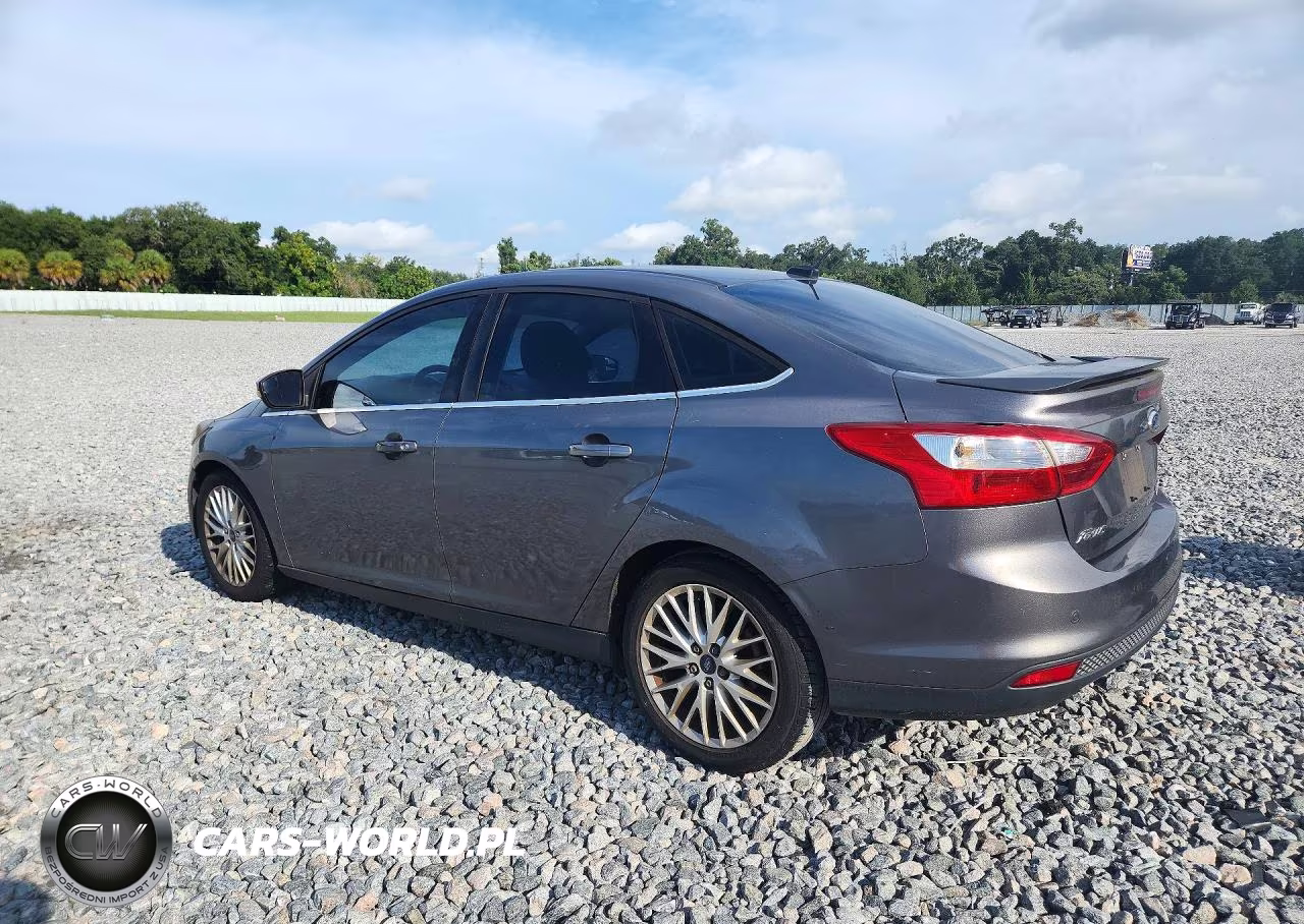 2013 Ford Focus Titanium VIN:1FADP3J24DL383692 - 2