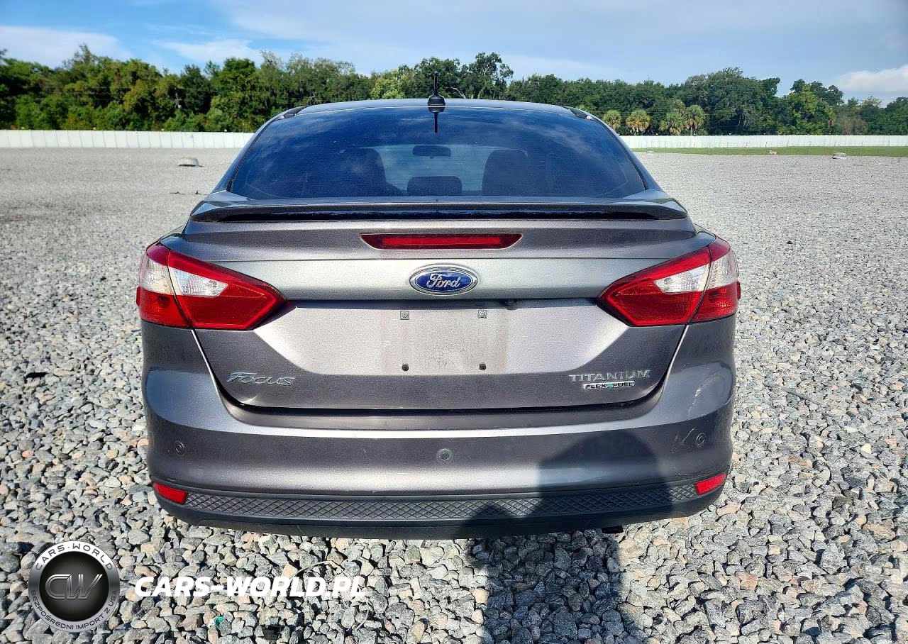 2013 Ford Focus Titanium VIN:1FADP3J24DL383692 - 6