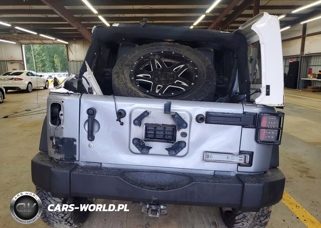 2013 Jeep Wrangler Unlimited Sport VIN:1C4BJWDG0DL702050 - 6