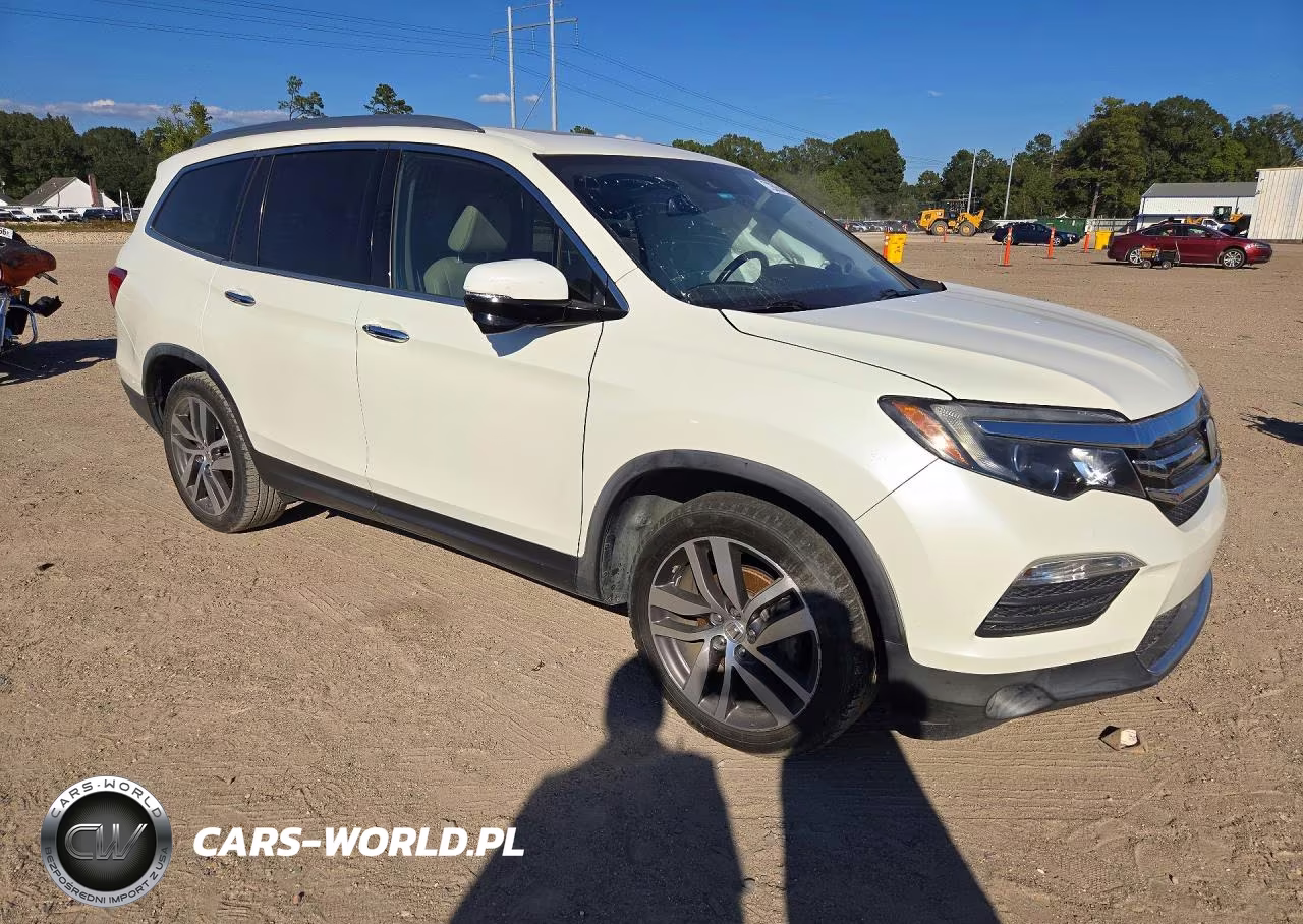 2016 Honda Pilot Touring VIN:5FNYF5H9XGB042012 - 4