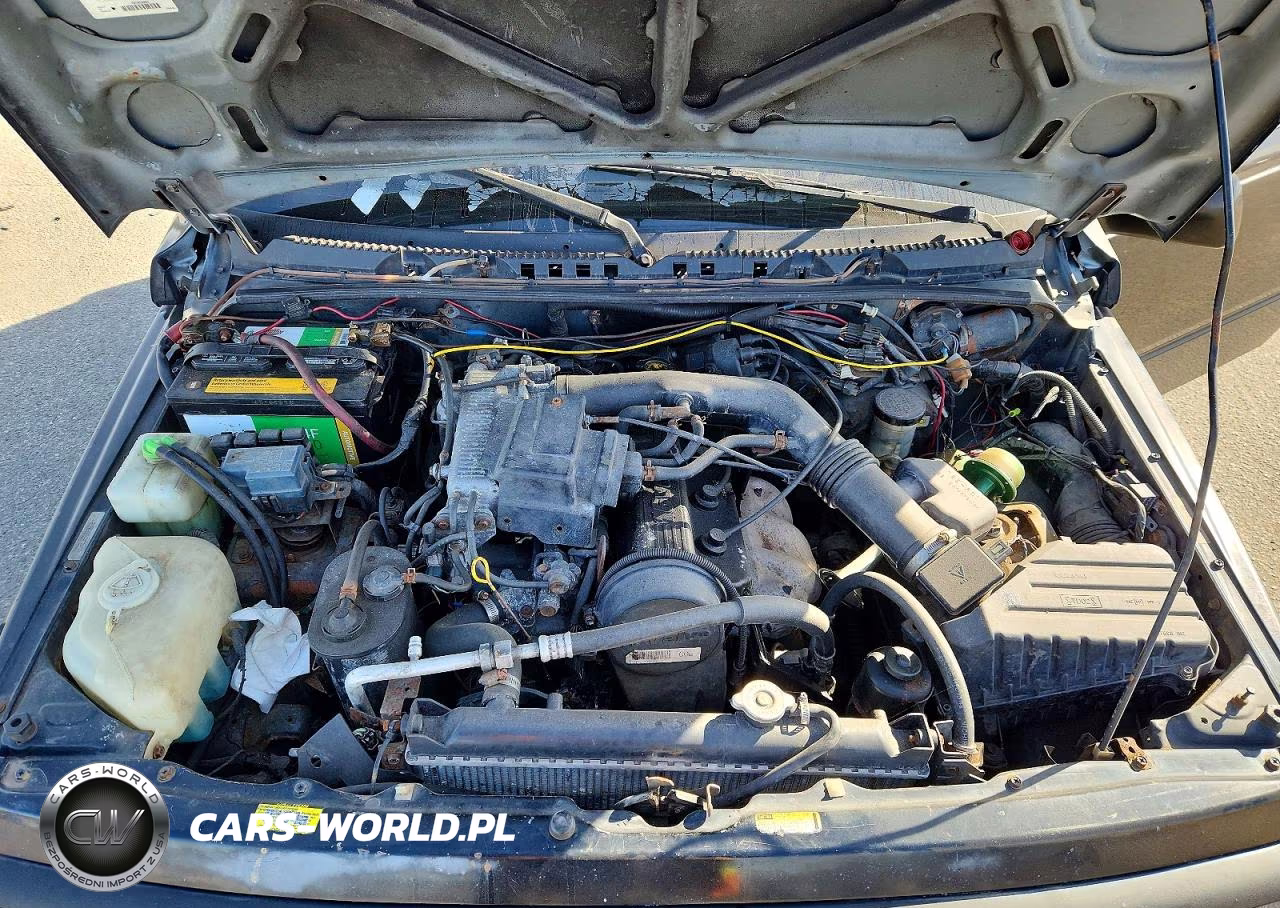 1998 Chevrolet Tracker VIN:2CNBE1867W6905372 - 11