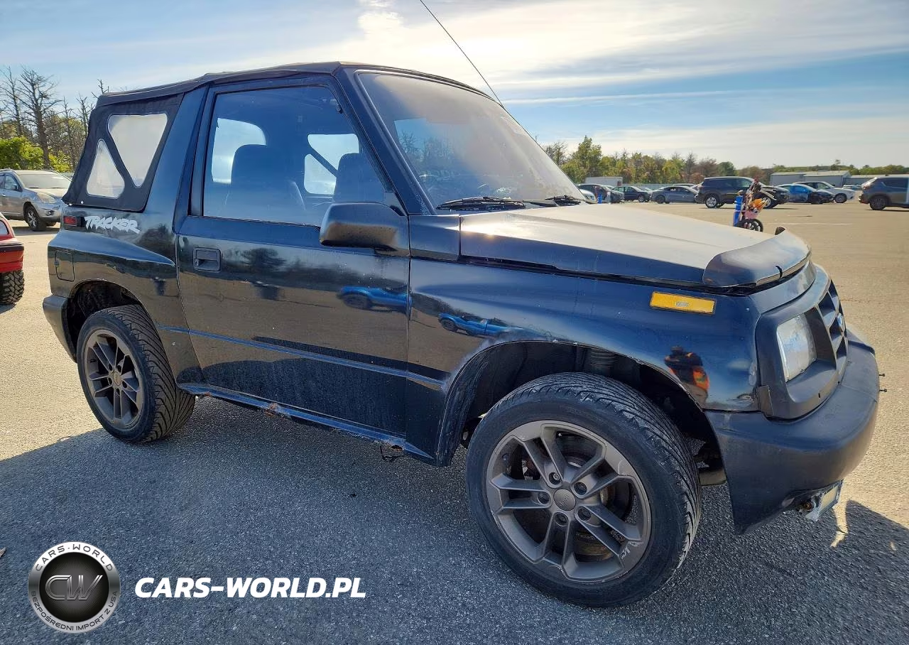 1998 Chevrolet Tracker VIN:2CNBE1867W6905372 - 4