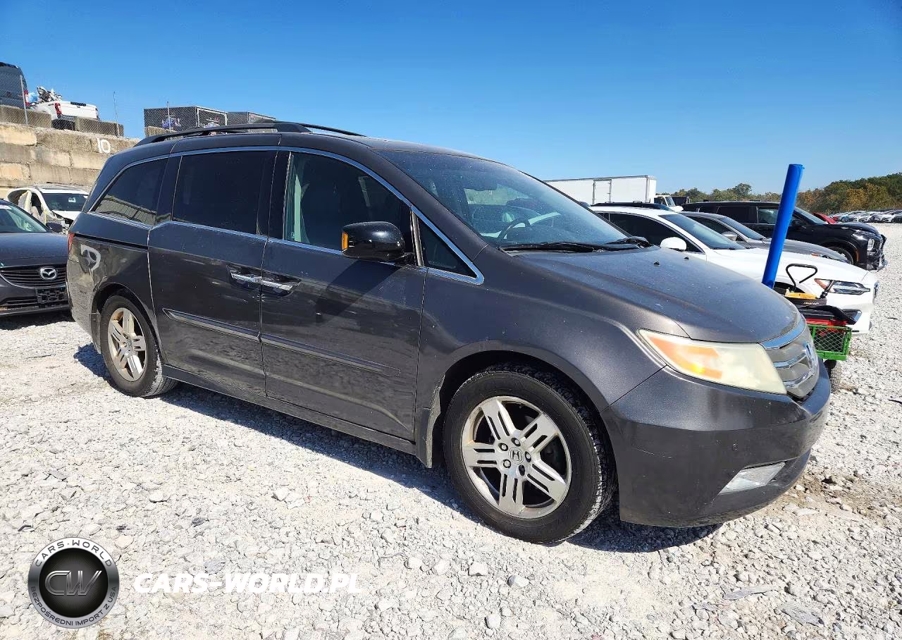 2011 Honda Odyssey Touring VIN:5FNRL5H93BB022867 - 4