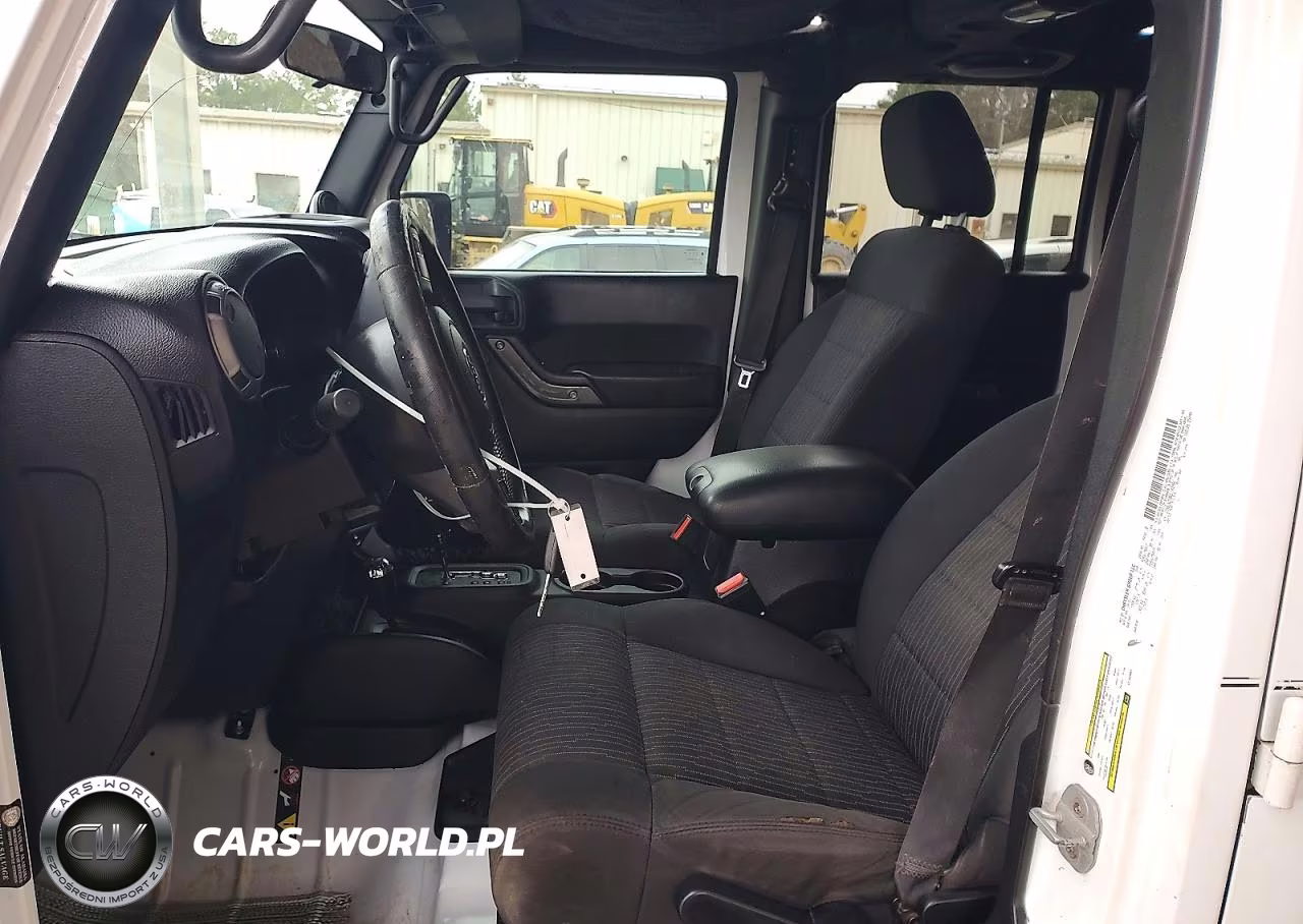 2012 Jeep Wrangler Unlimited Sport VIN:1C4BJWDG6CL142081 - 7